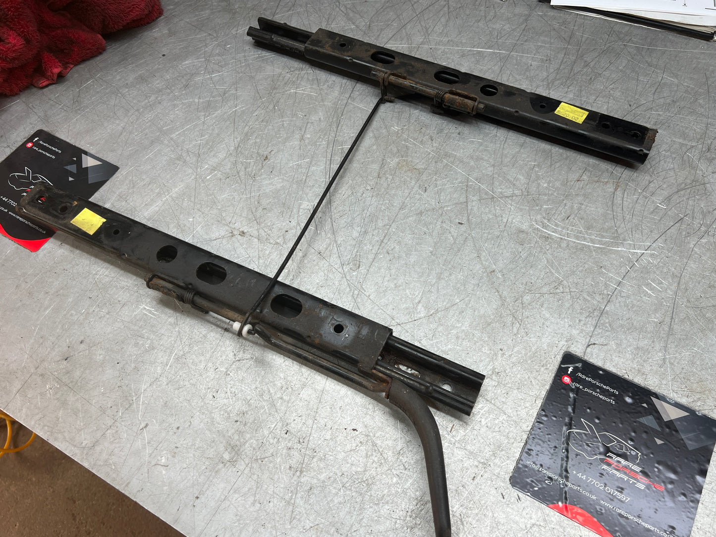 Porsche 944/968 pair of late type seat runners, manual, left side, used