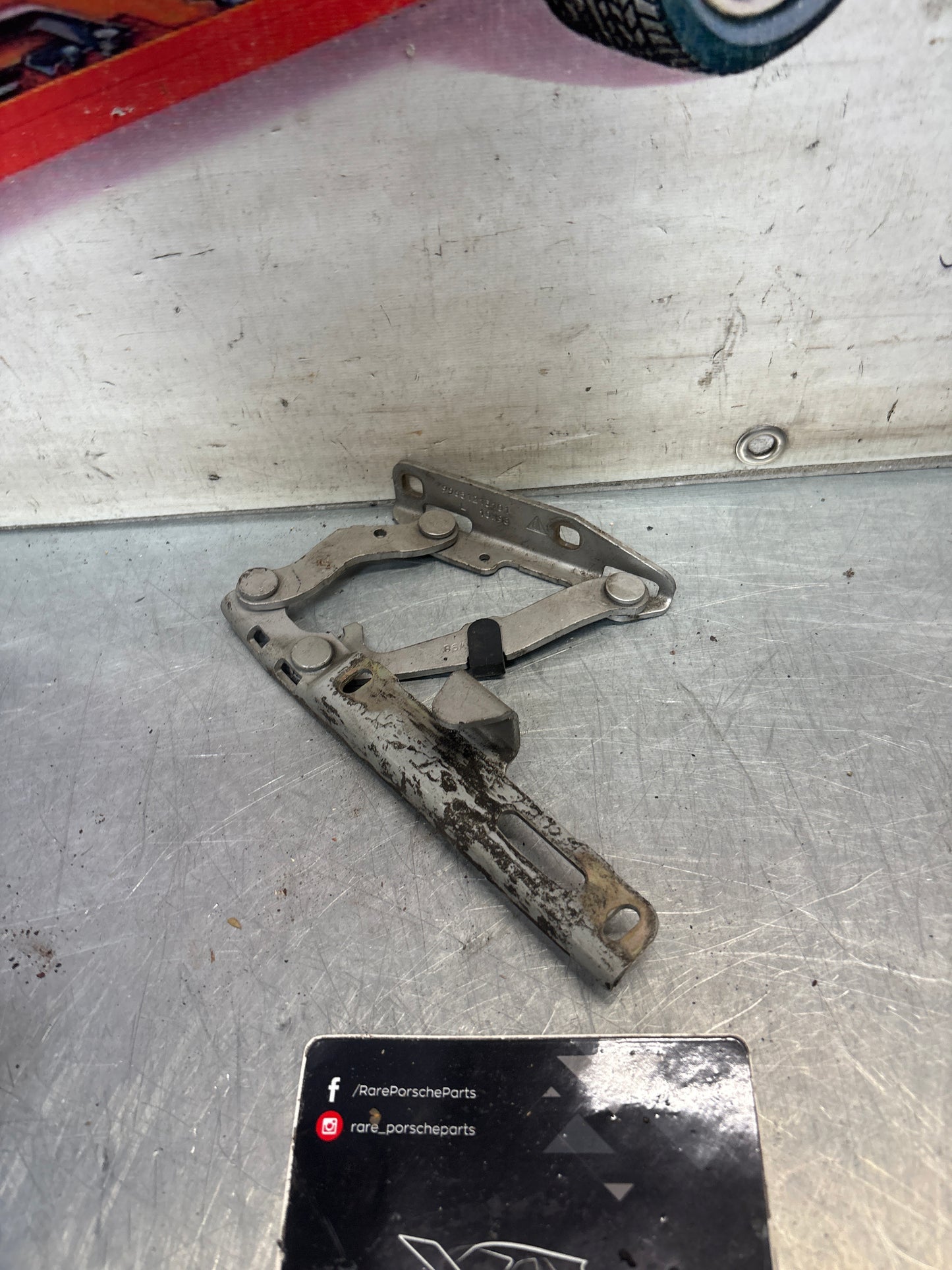 Porsche 911 996 / 986 engine deck lid hinge left side, used 99651215101