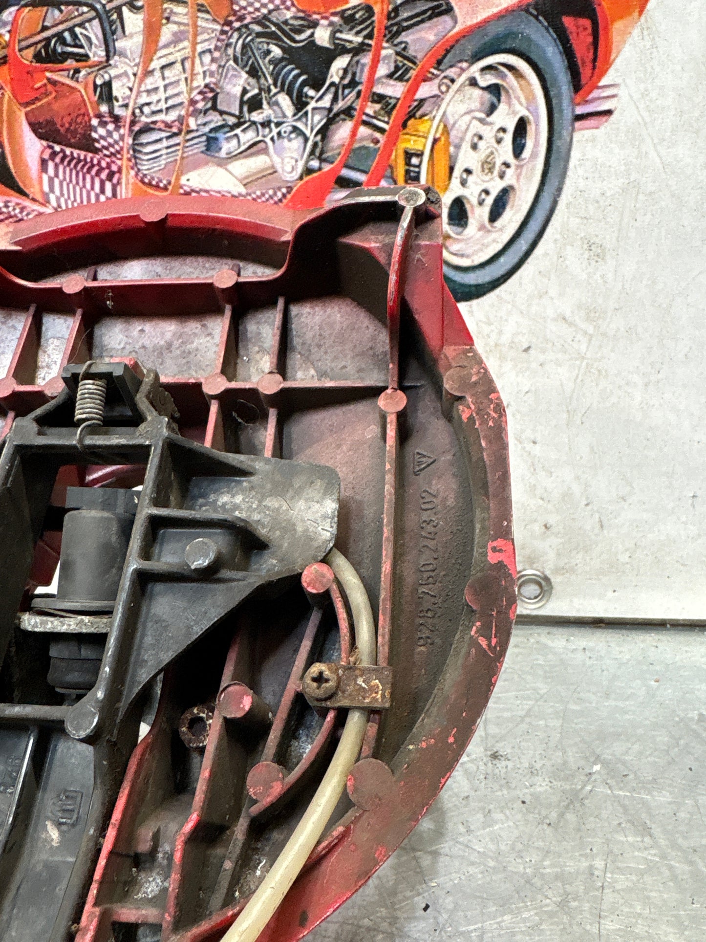 Porsche 928 left headlight swivel frame 92875024902 92875024302 used