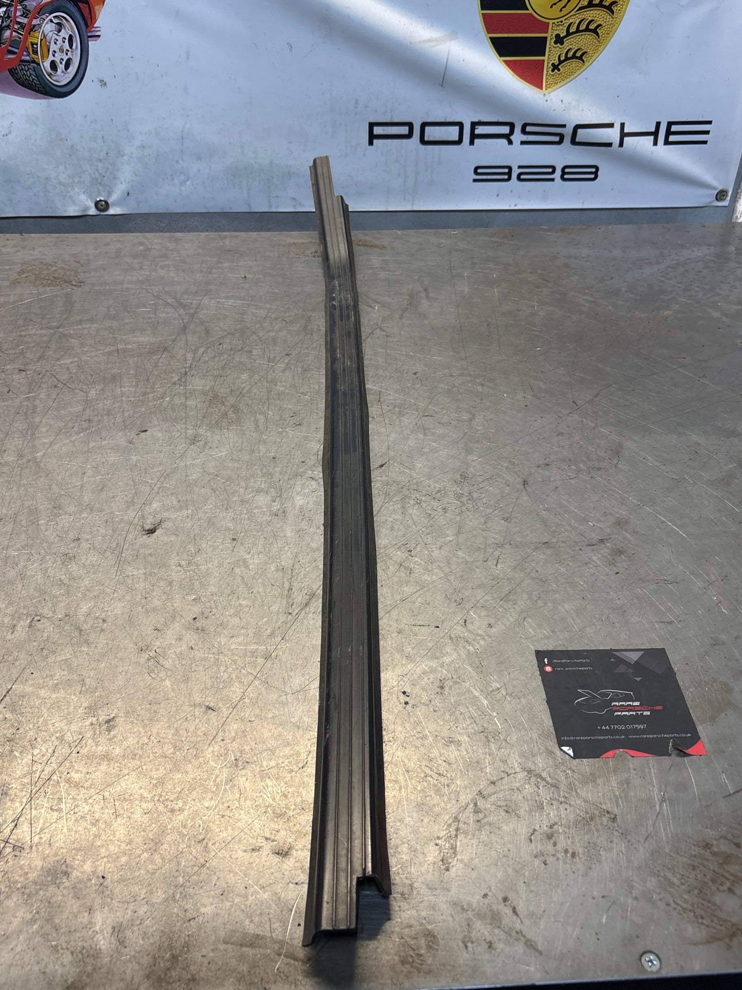 Porsche early 924/944 left sill trim, used 477853657A