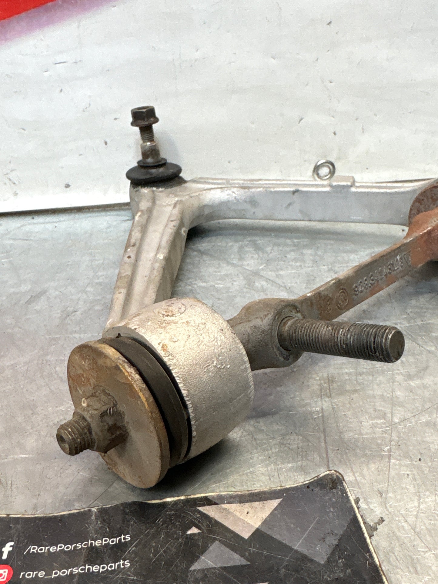 Porsche 928 front upper left control arm, used 92834145722