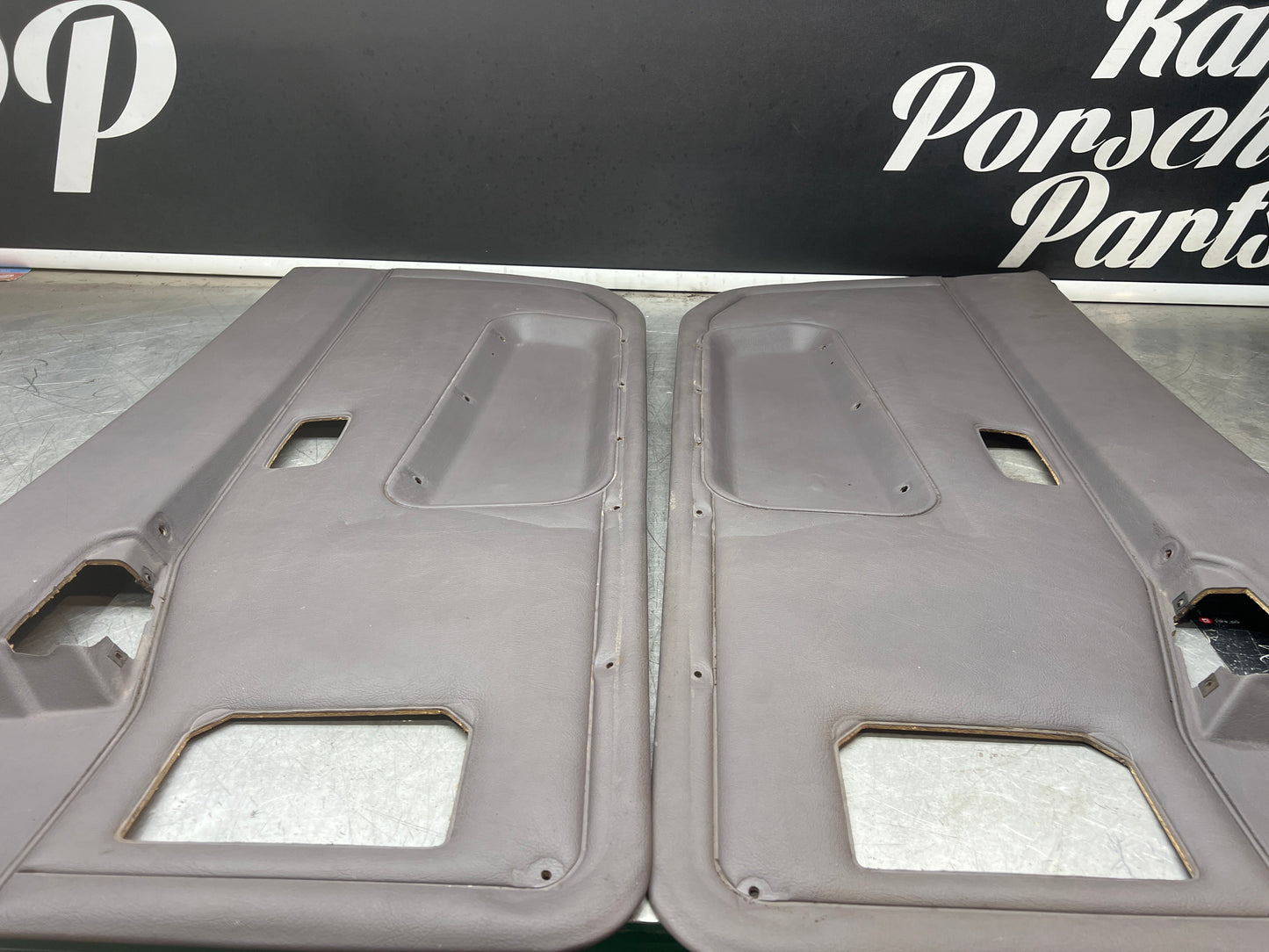 Porsche 944 85.5- pair of late UsedPorsche grey door cards, 94455501701 / 94455501801 used