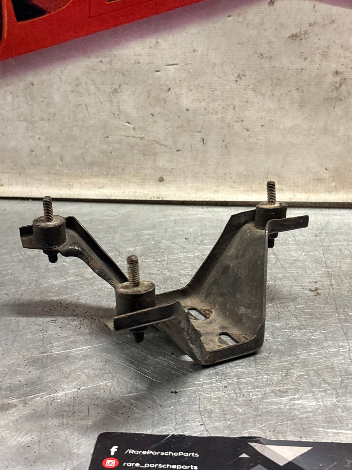Porsche 924 Turbo air filter housing support bracket 477805513, used