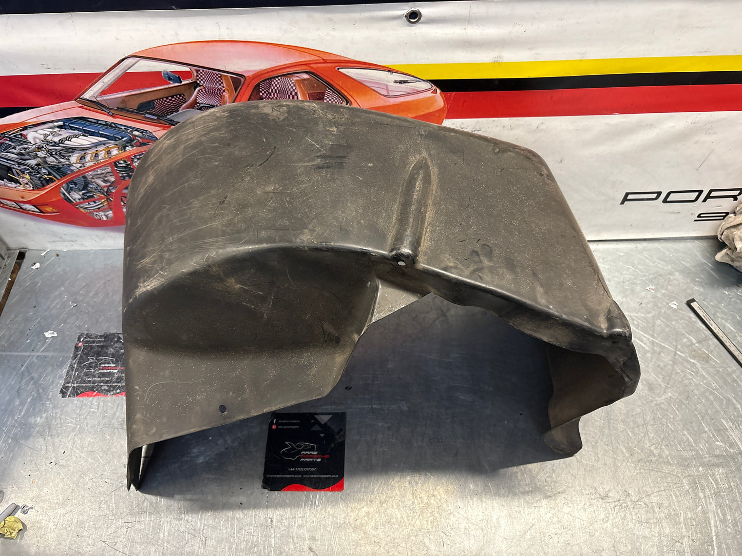 Porsche 928 wheel arch liner  Left 92850438105 Used