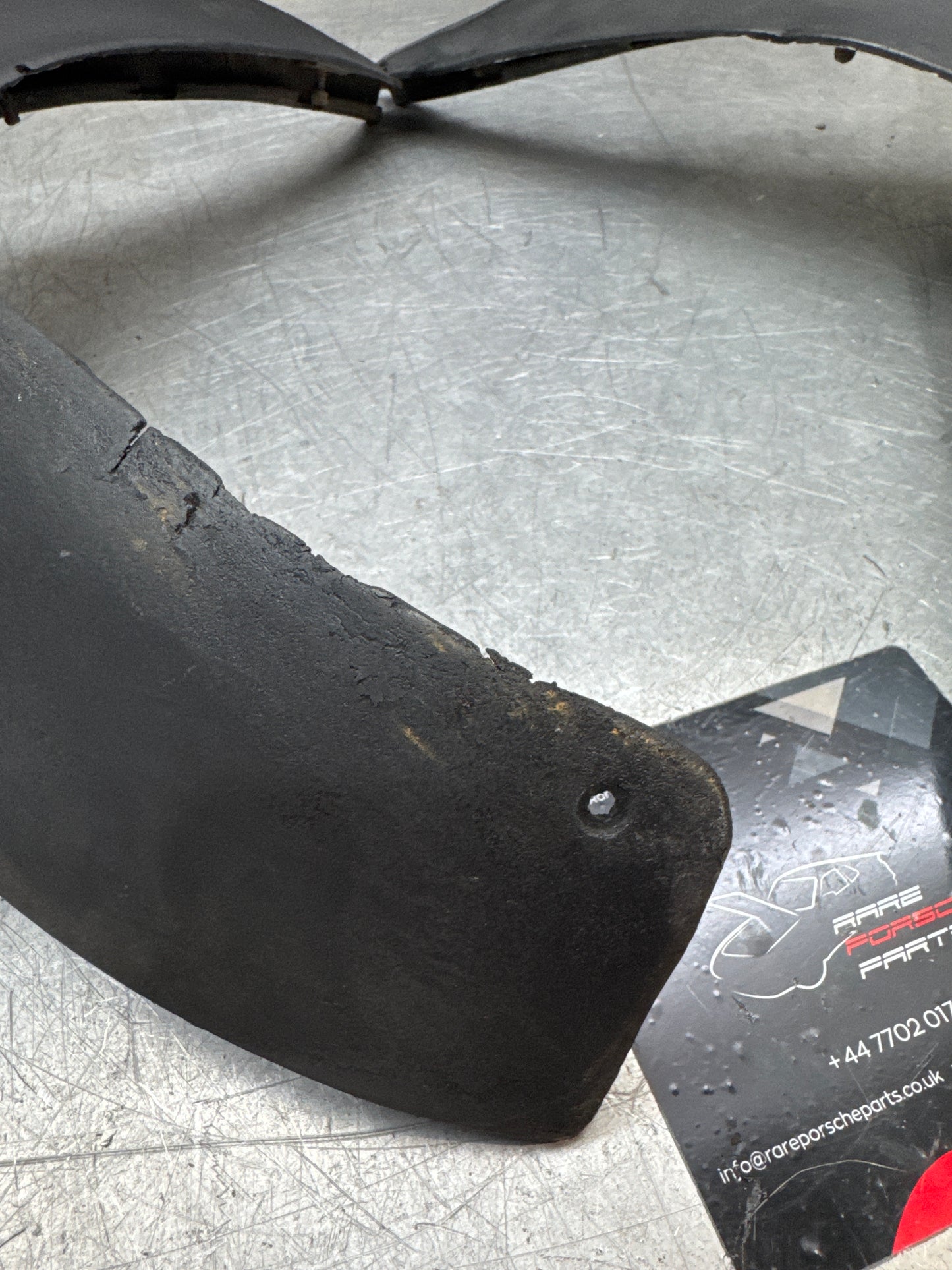 Porsche 924 pair of used rear spats, wheel arch trims, mud guards, 477853383 / 477853384 spare or repair