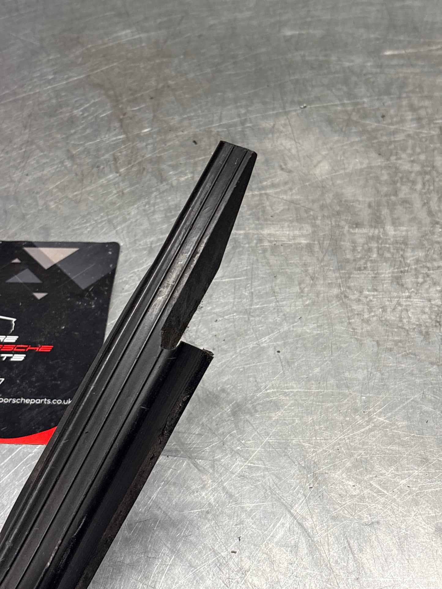 Porsche early 924/944 left sill trim, used 477853657A