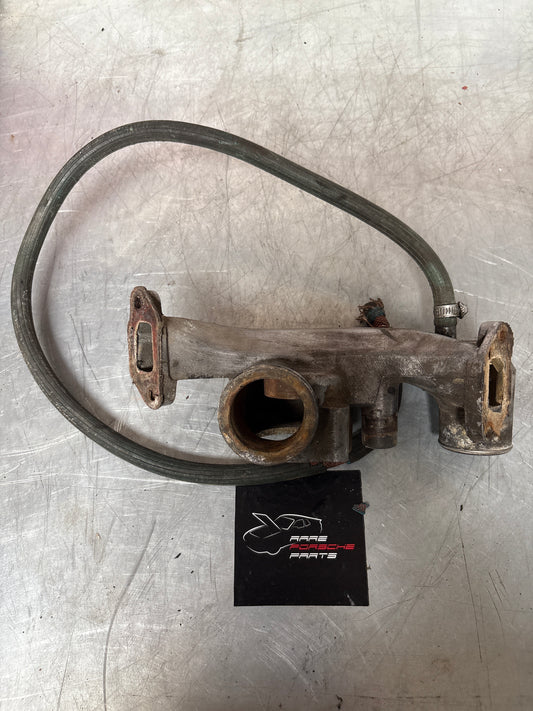 Porsche 928 thermostat housing, used 9281061616R