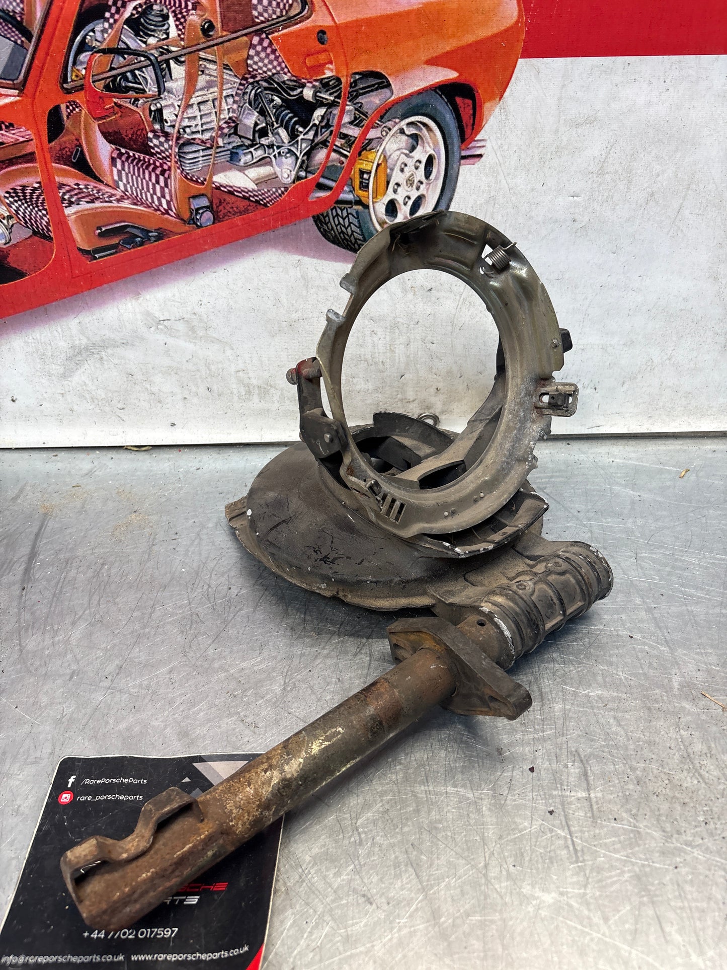 Porsche 928 right headlight swivel frame 92875024902 92875024302 used