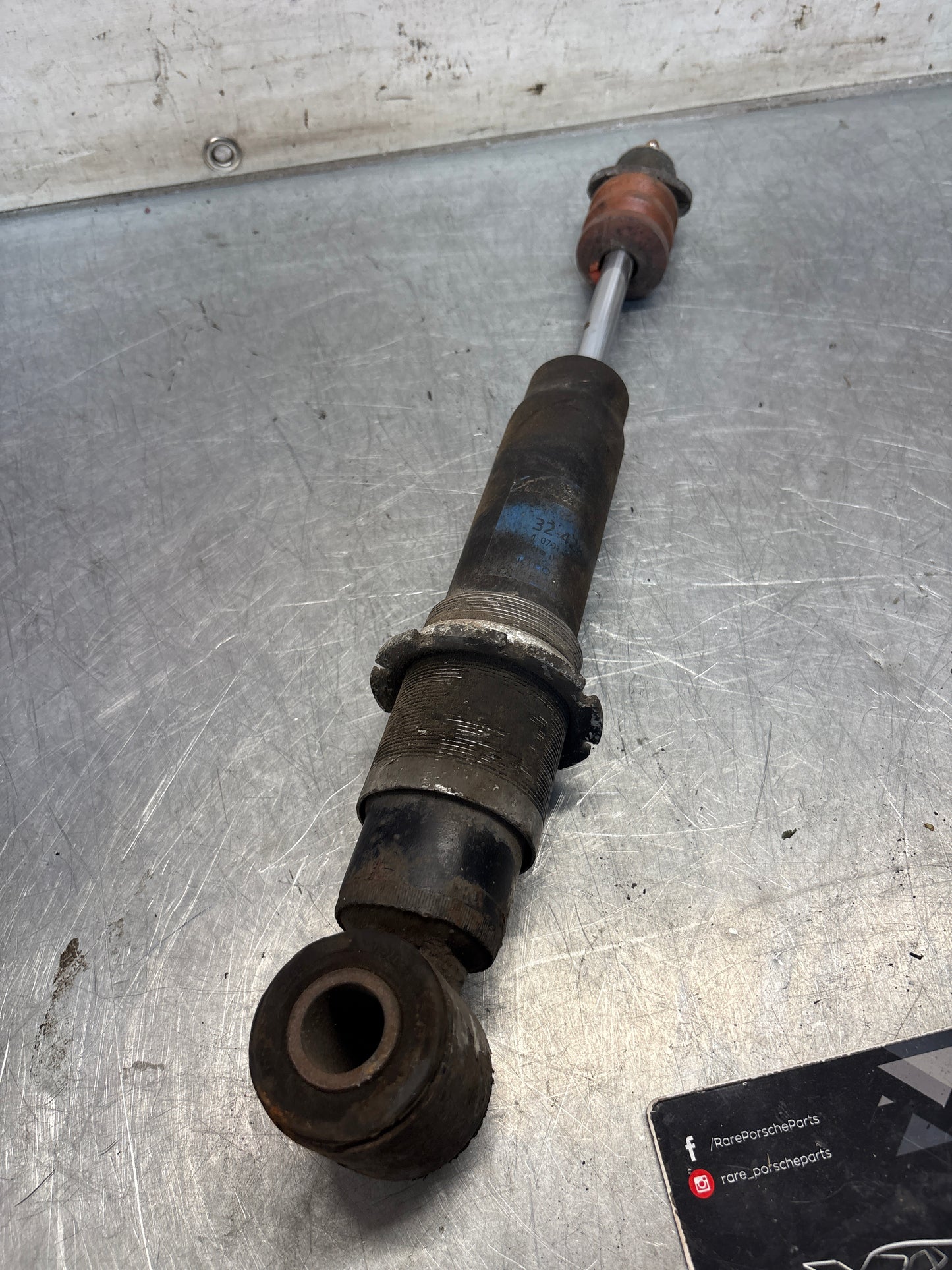 Porsche 928 rear shock absorber, used 92833305116