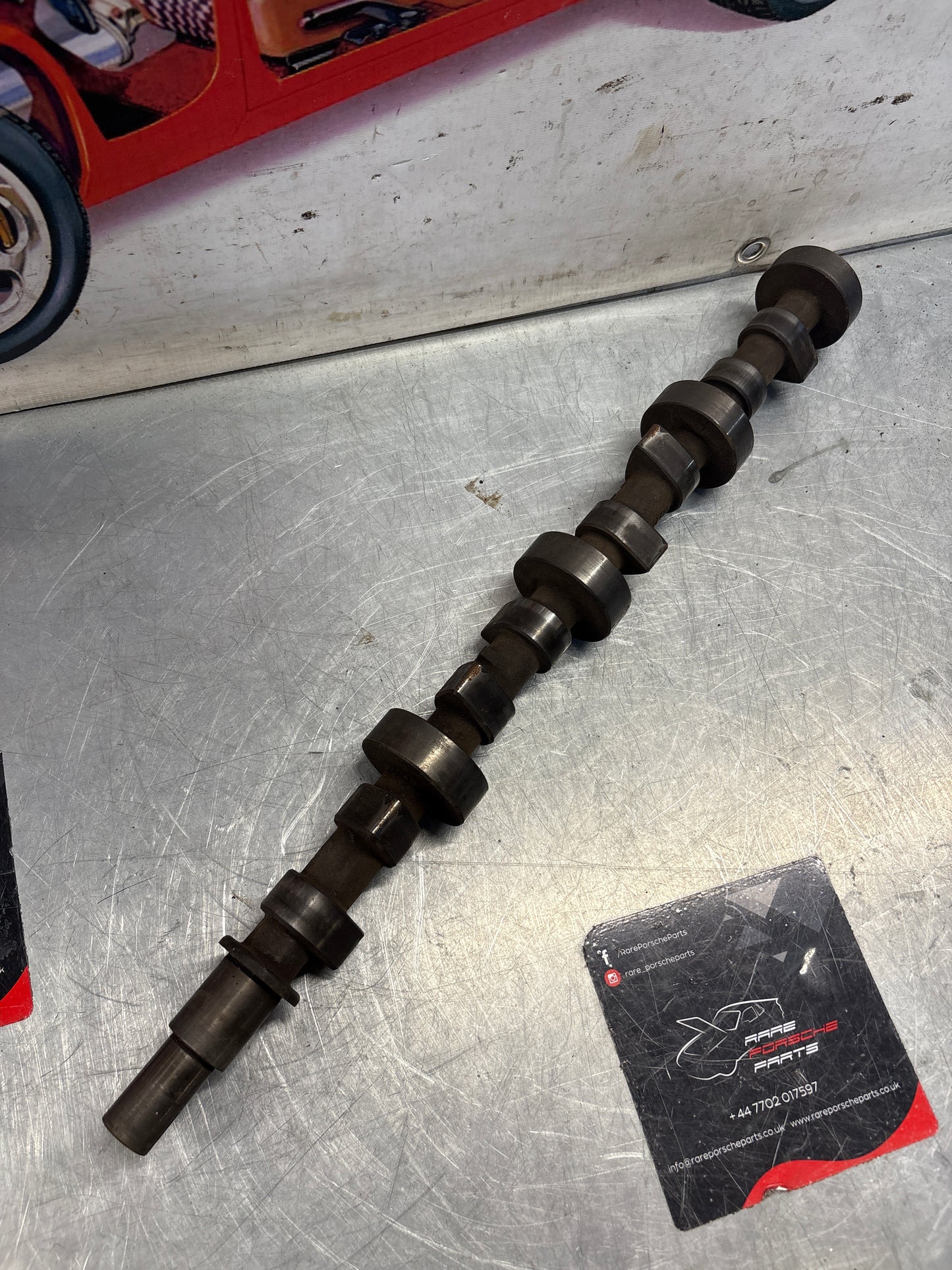 Porsche 928 cam shaft, used 9281052030R