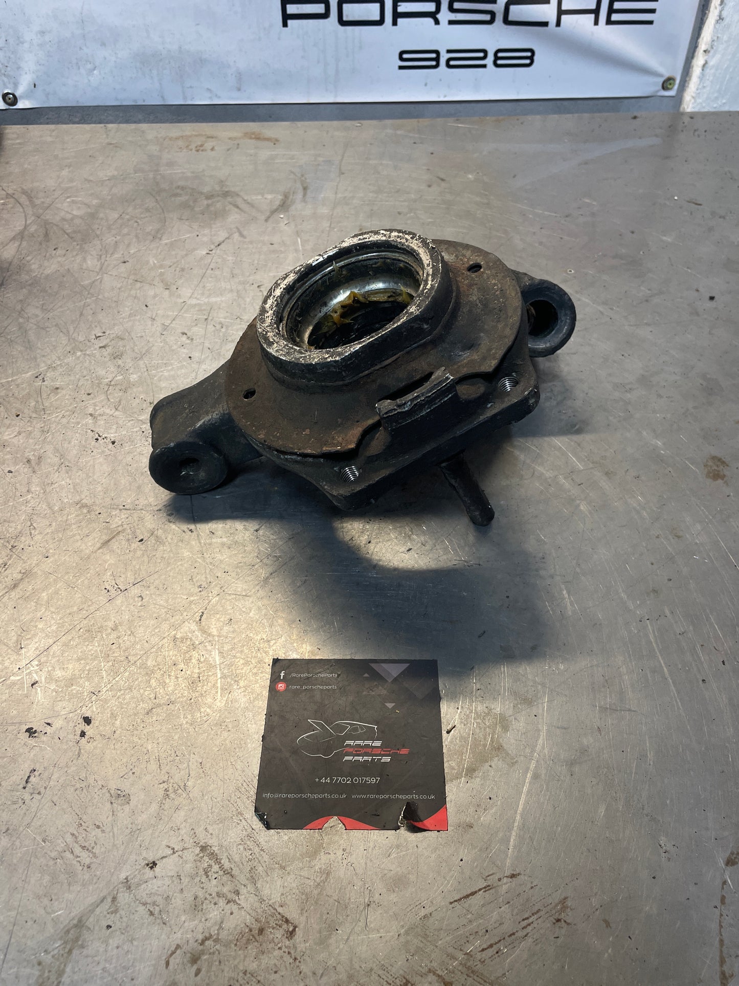 Porsche 928 rear left wheel hub carrier, used 9283312174R