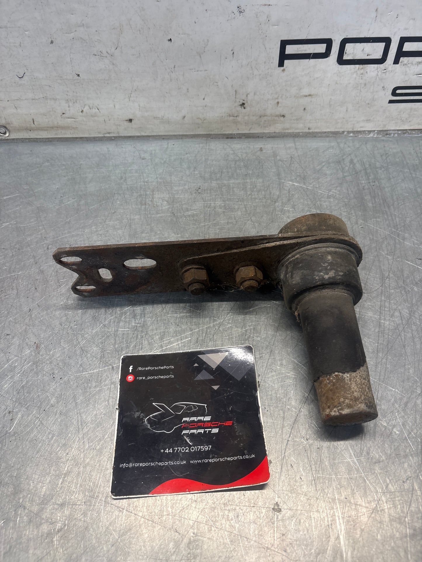 Porsche 924 / 944 left trailing arm, used 477511201