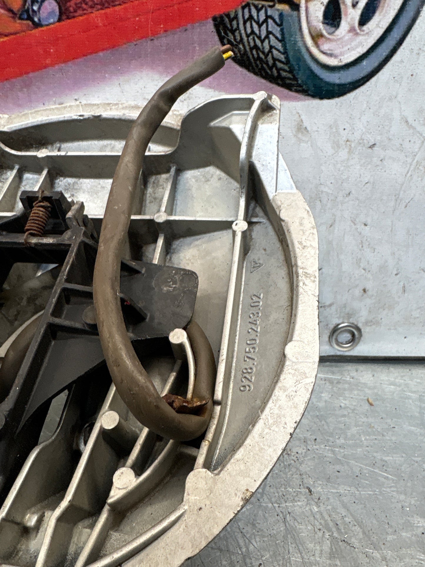 Porsche 928 right headlight swivel frame 92875024902 92875024302 used