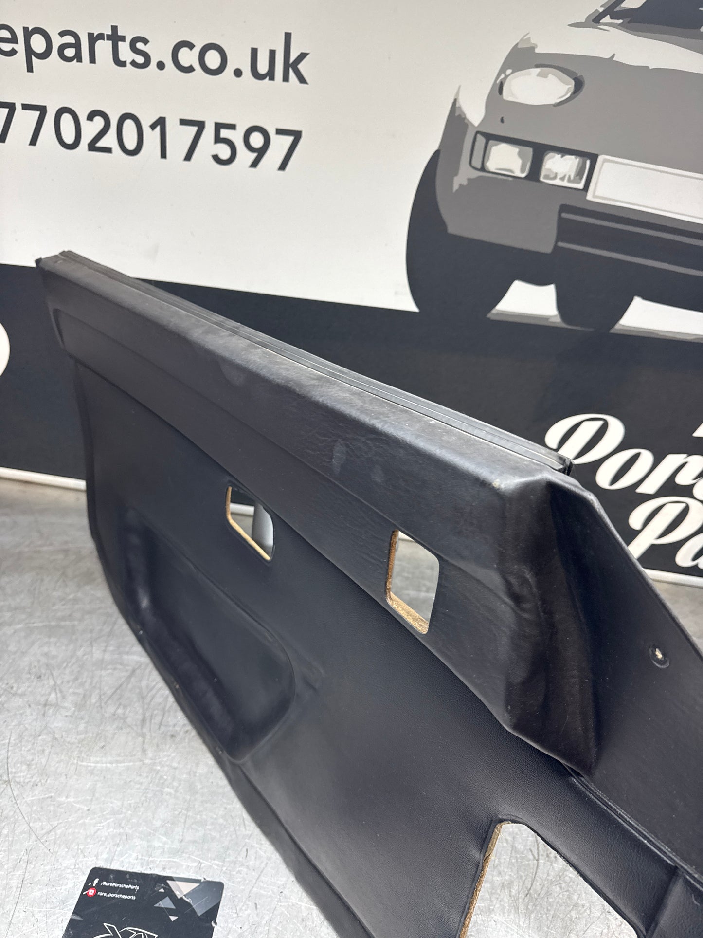 Porsche 924/ Early 944 black RHD Left door card. Fibreglass repaired. 477867012