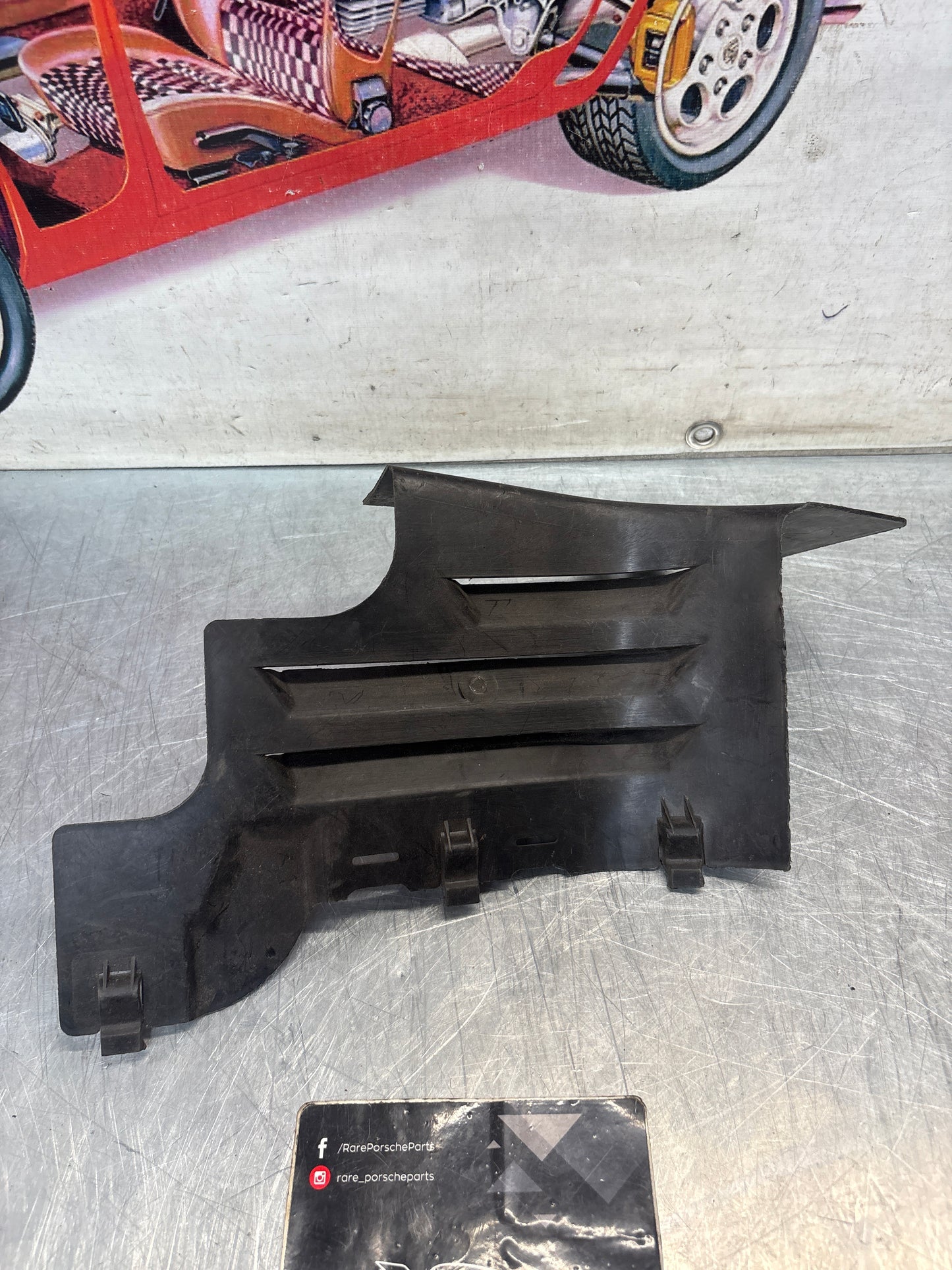Porsche 968 left front wheel housing extension, genuine 94450438501