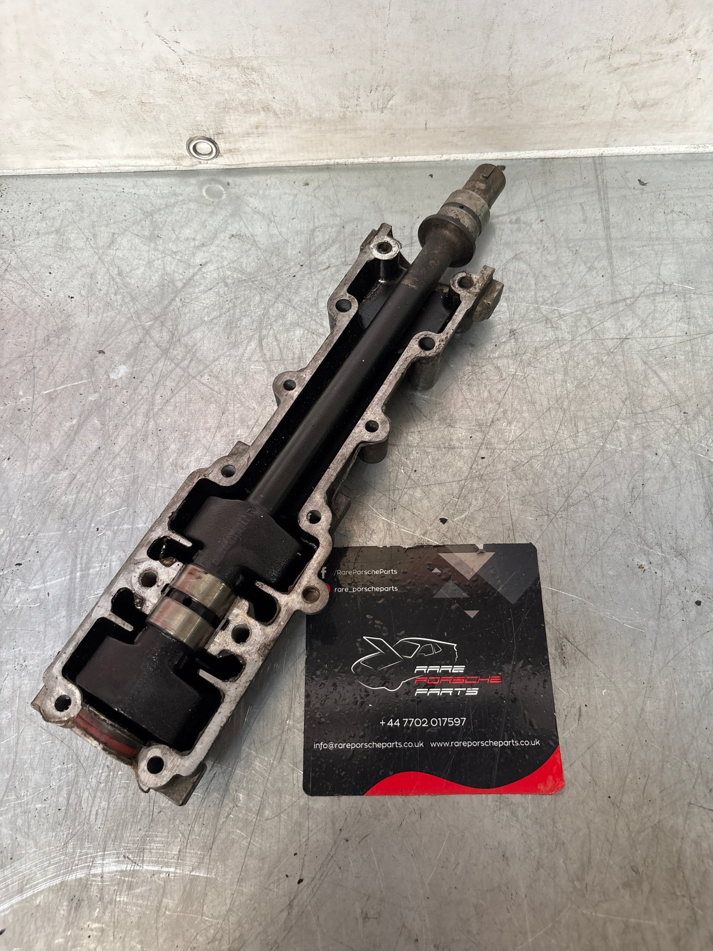 Porsche 944 Balance shaft, with housing, used 9441011057R