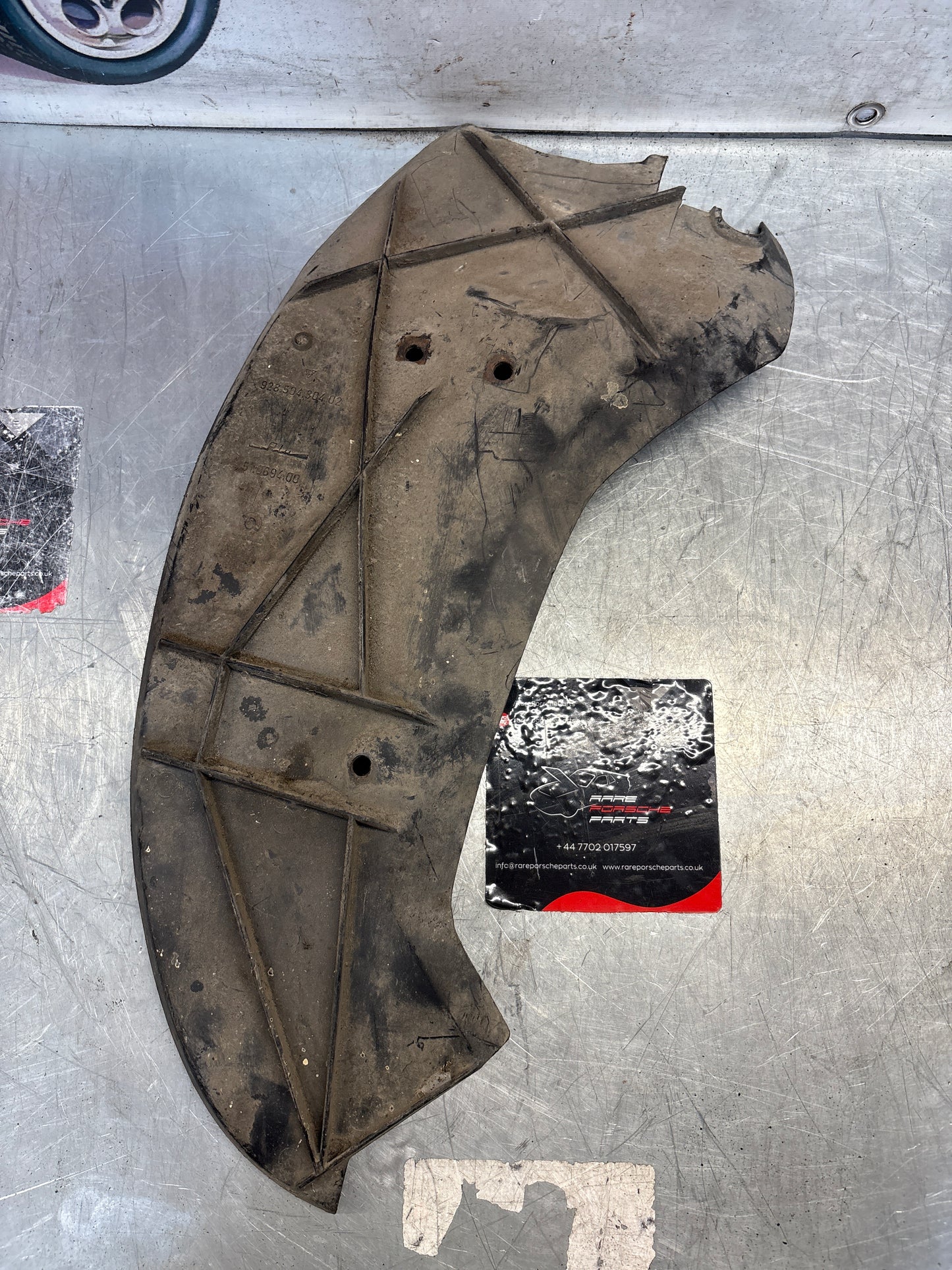 Porsche 928 rear right fender wheel cover, used 92850430402