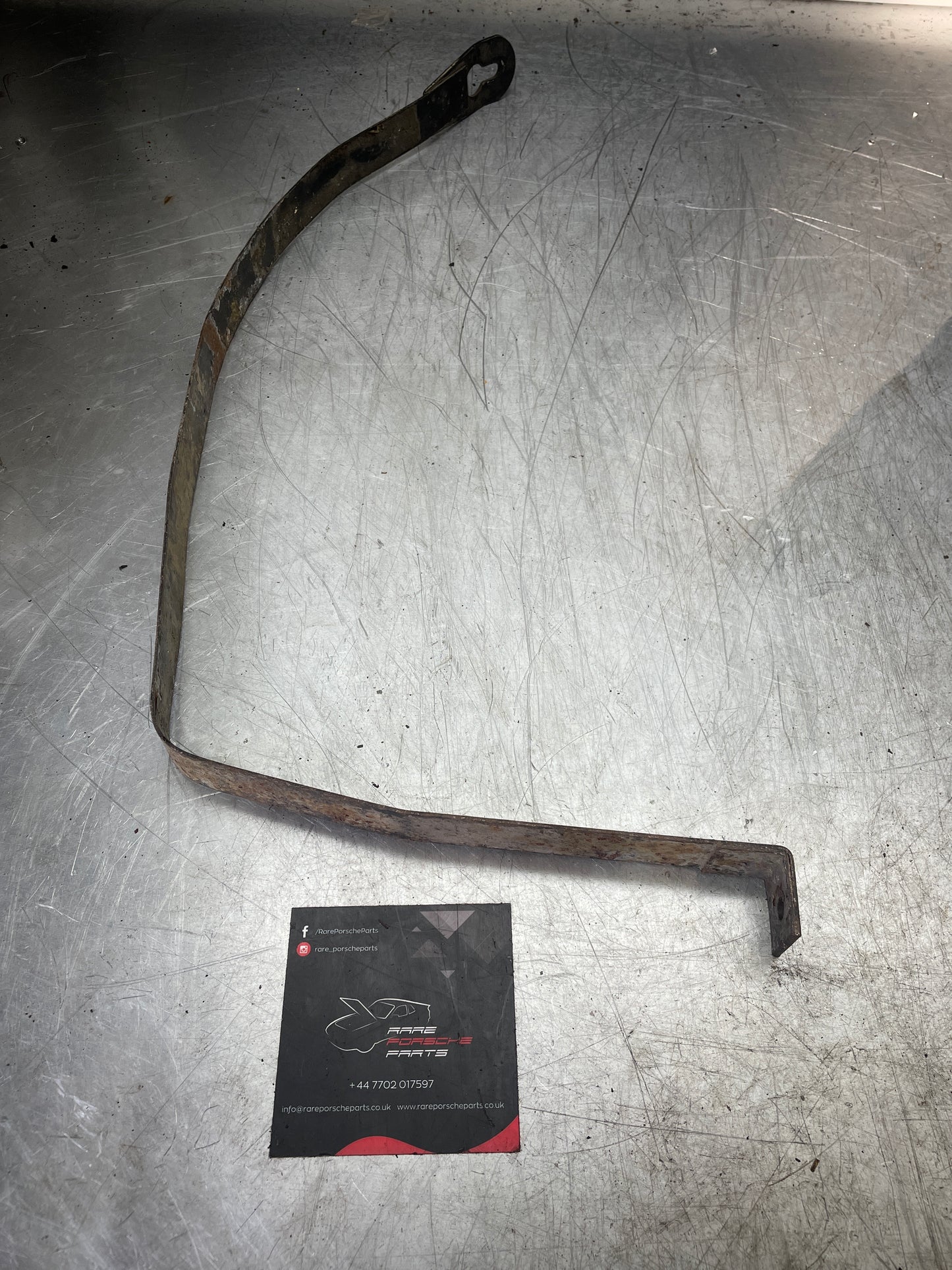 Porsche 944 90- fuel tank restraining strap, right used 95120131202 aftermarket, stainless steel