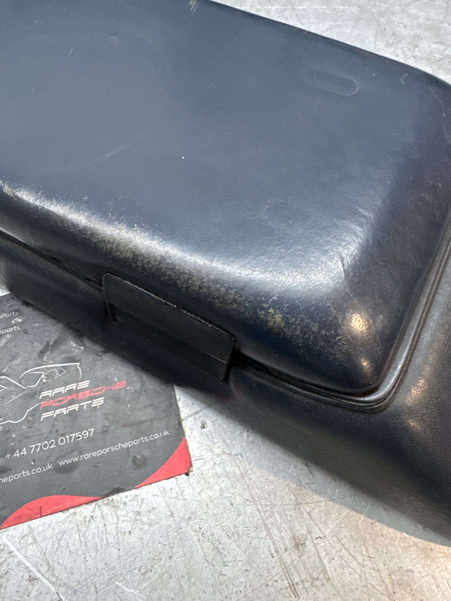 Porsche 928 92755572903 Central armrest cassette compartment black, used RHD