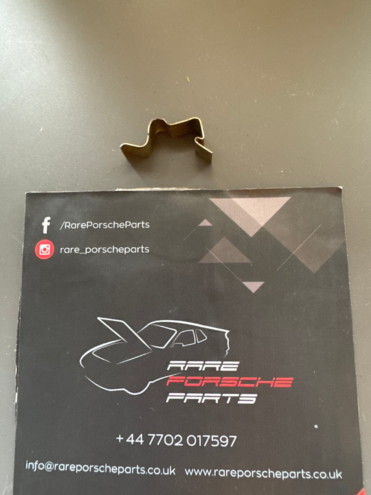 Porsche spring clip 477819343 used