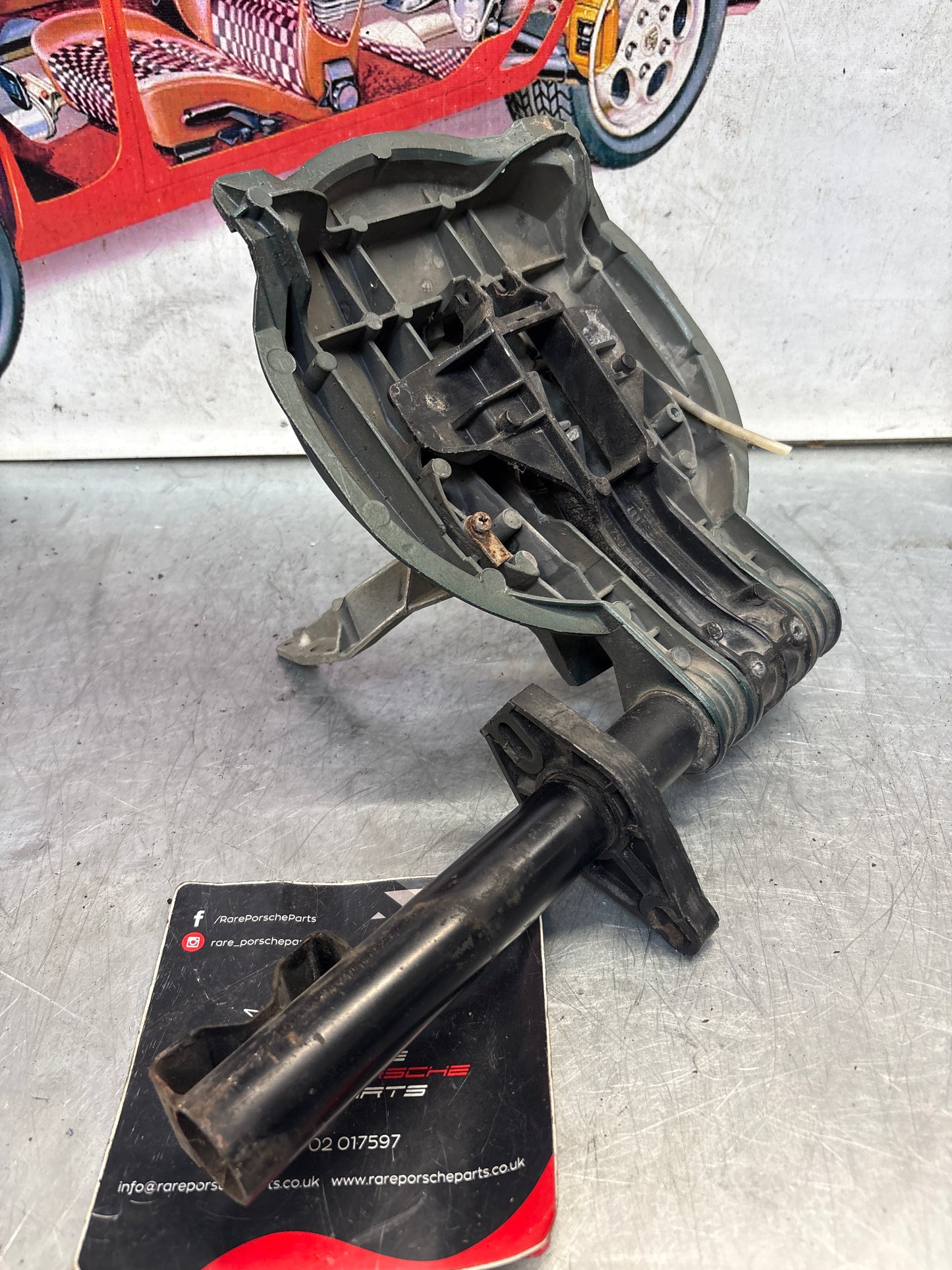 Porsche 928 left headlight swivel frame 92875024902 92875024302 used