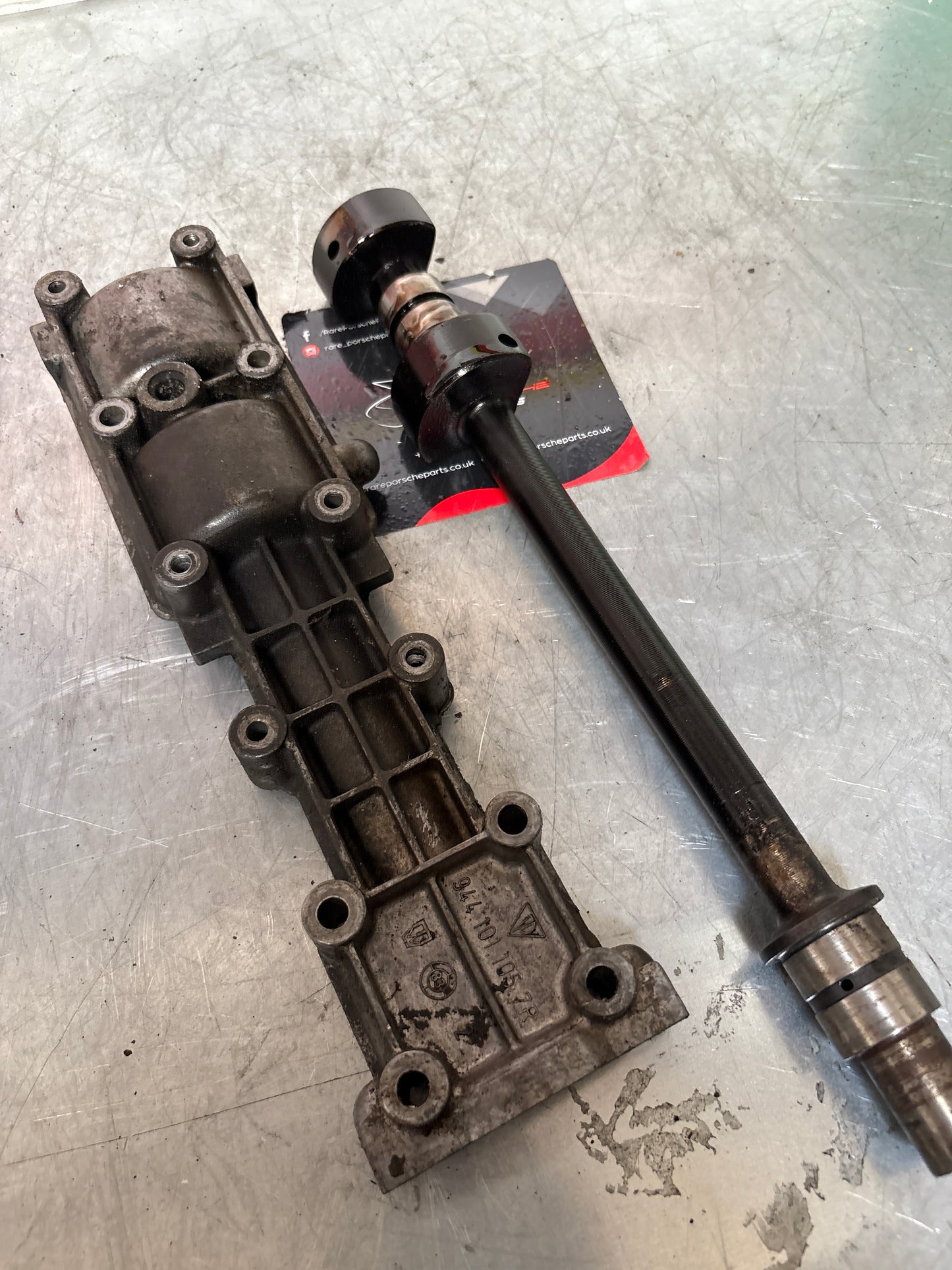 Porsche 944 Balance shaft, with housing, used 9441011057R