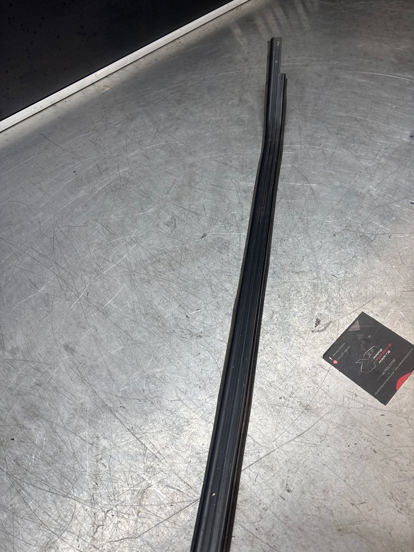 Porsche early 924/944 left sill trim, used 477853657A