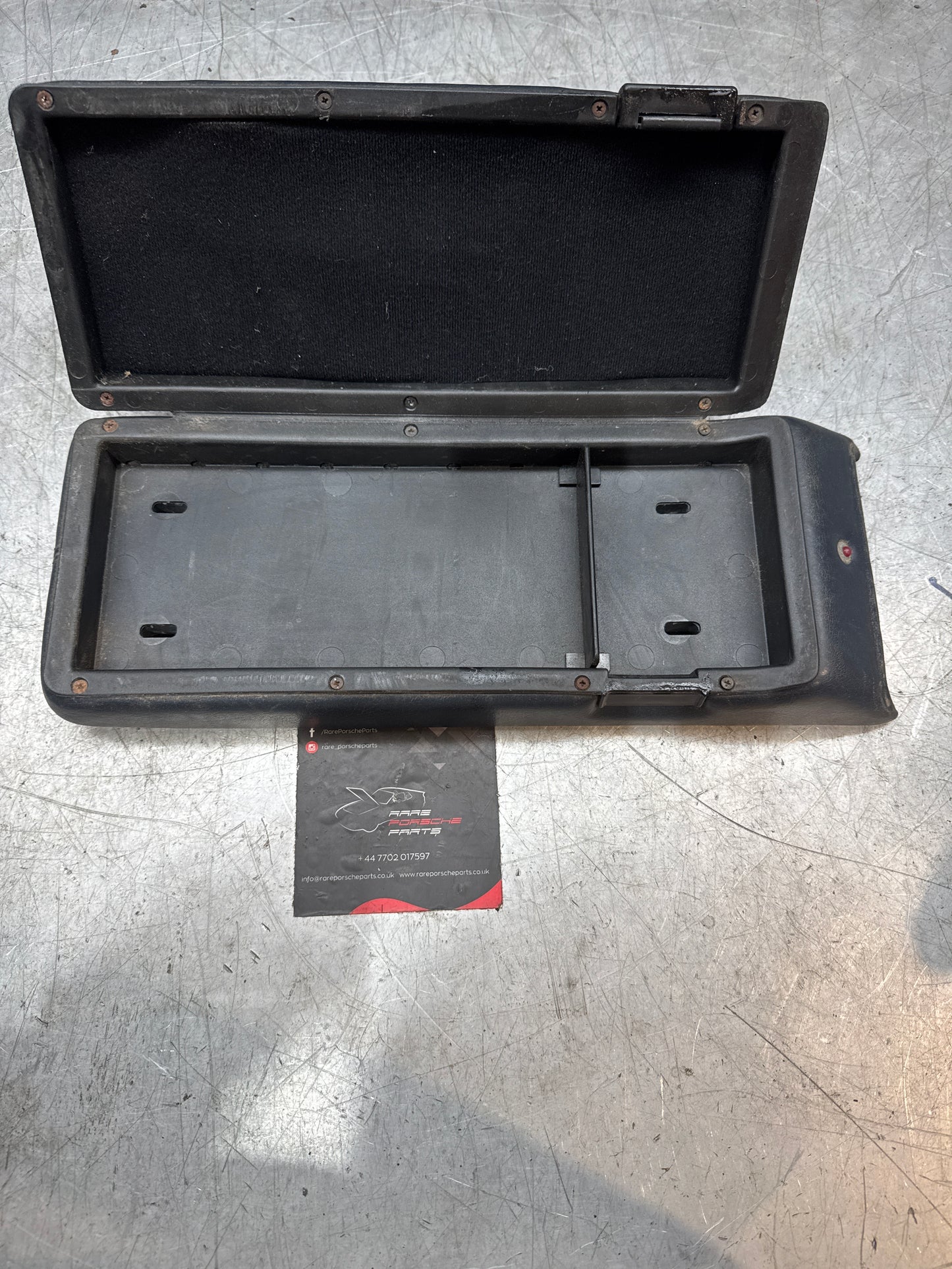 Porsche 928 92755572903 Central armrest cassette compartment black, used RHD