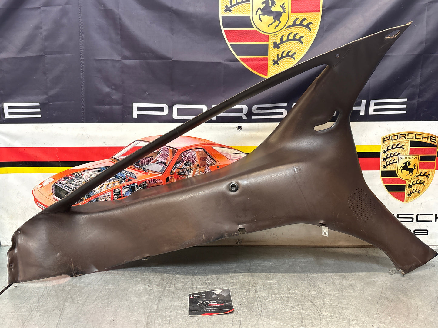 Porsche 928 early left side lower side trim panel, without loudspeaker, brown used 92855502102