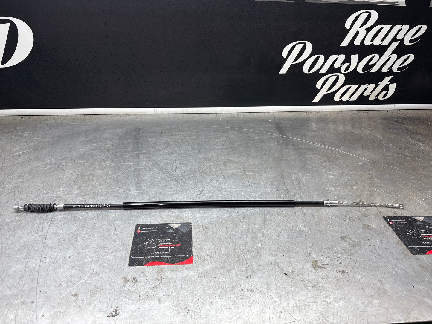 Porsche 944 short handbrake cable, new 95142407102