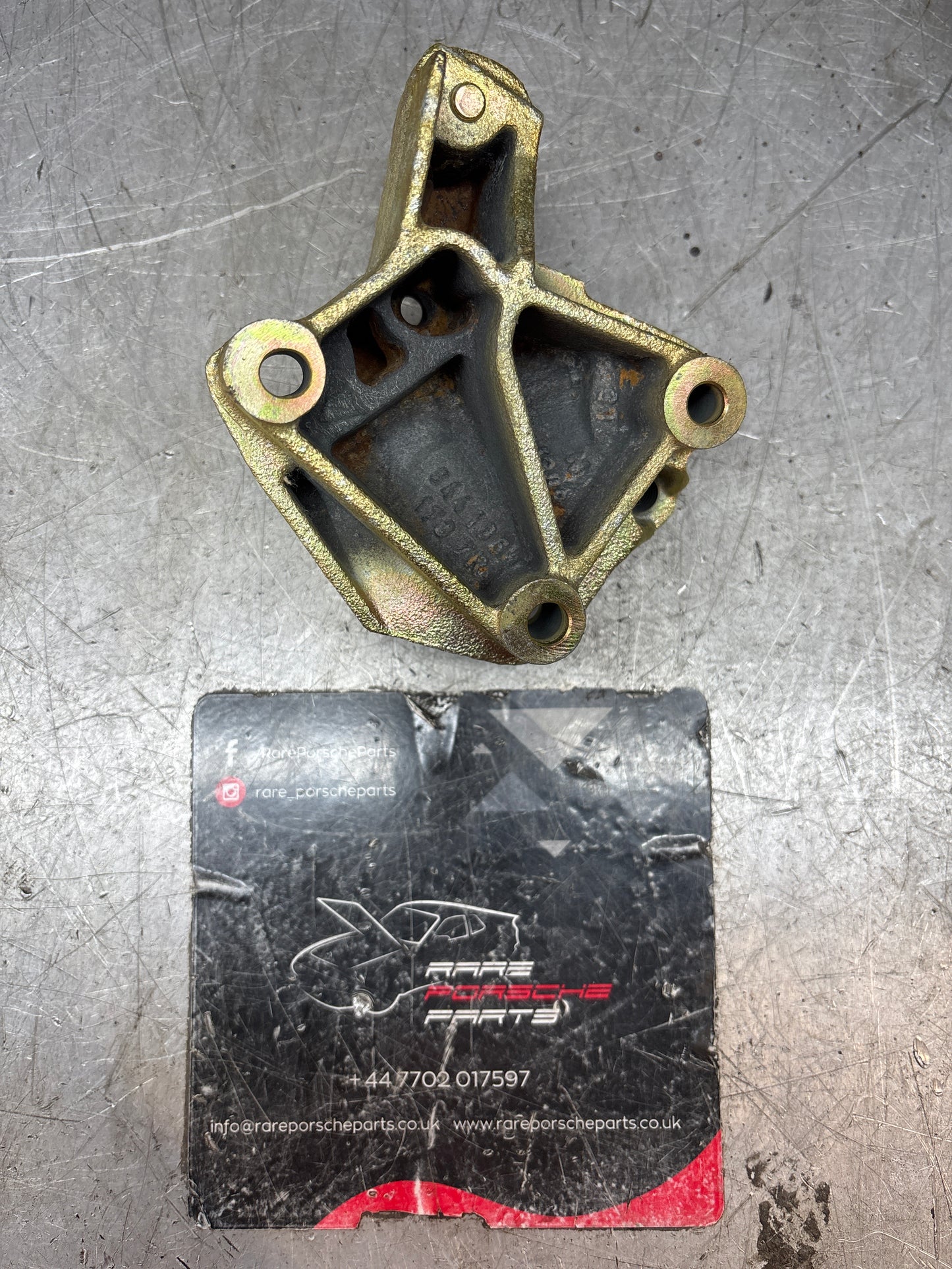 Porsche 924S / 944 belt tensioner  support bracket, used 9441051737R