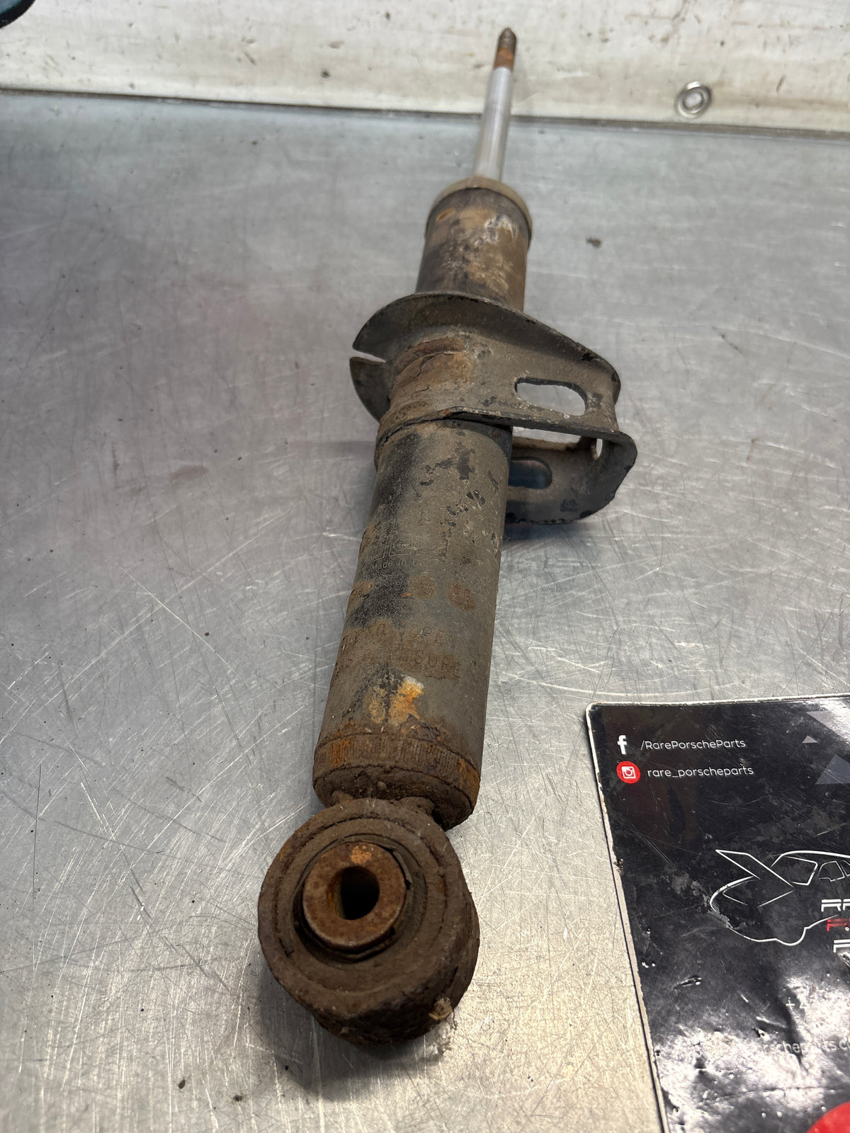 Porsche 911 993 rear shock absorber, used 99333305100