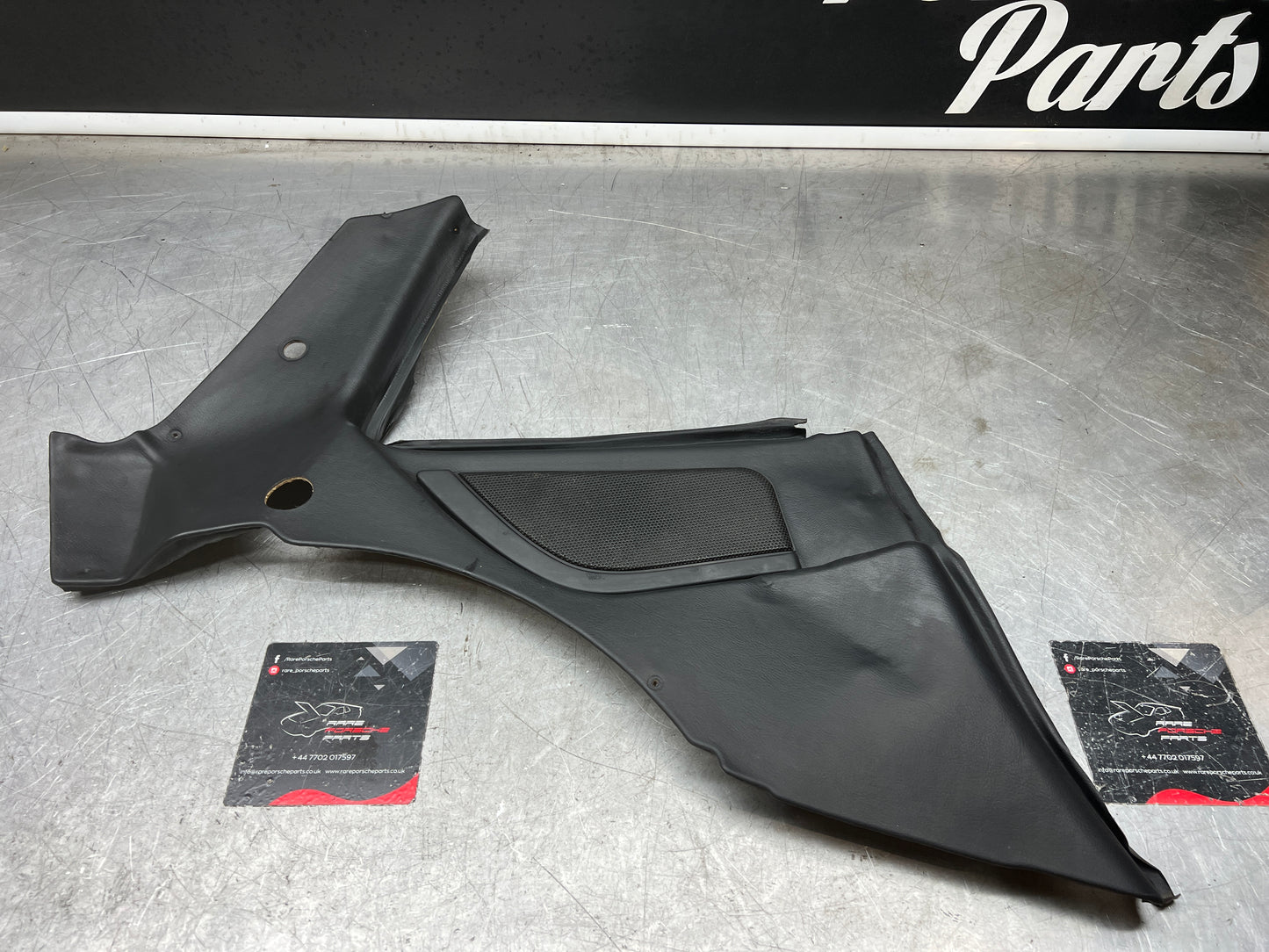 Porsche 944 Left Rear Quarter Trim Card, black  - used 944555021 M490 sound pack