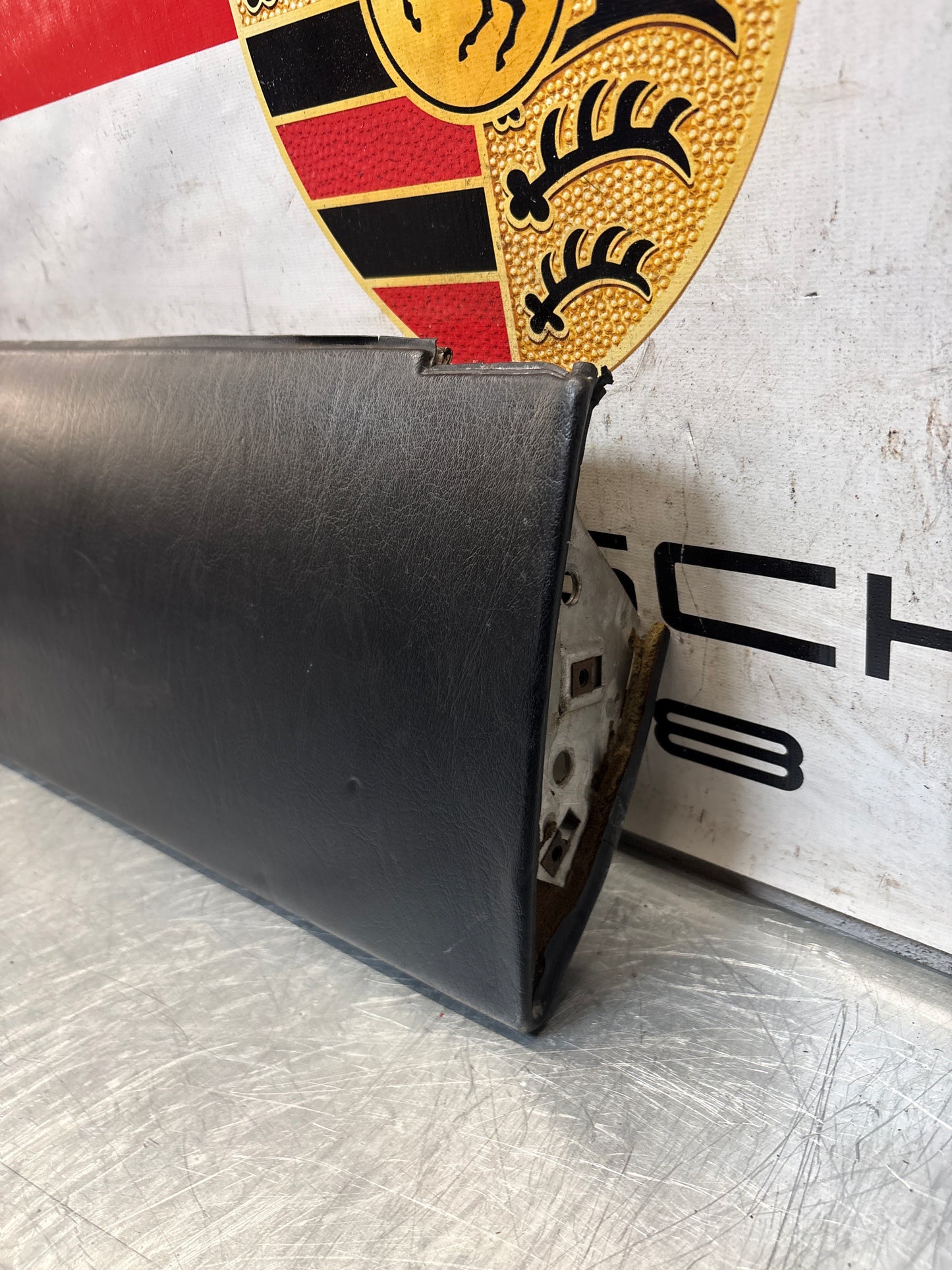 Porsche 911 964 dashboard lower knee protection trim, black leather, used 96455207304 / 96455207300