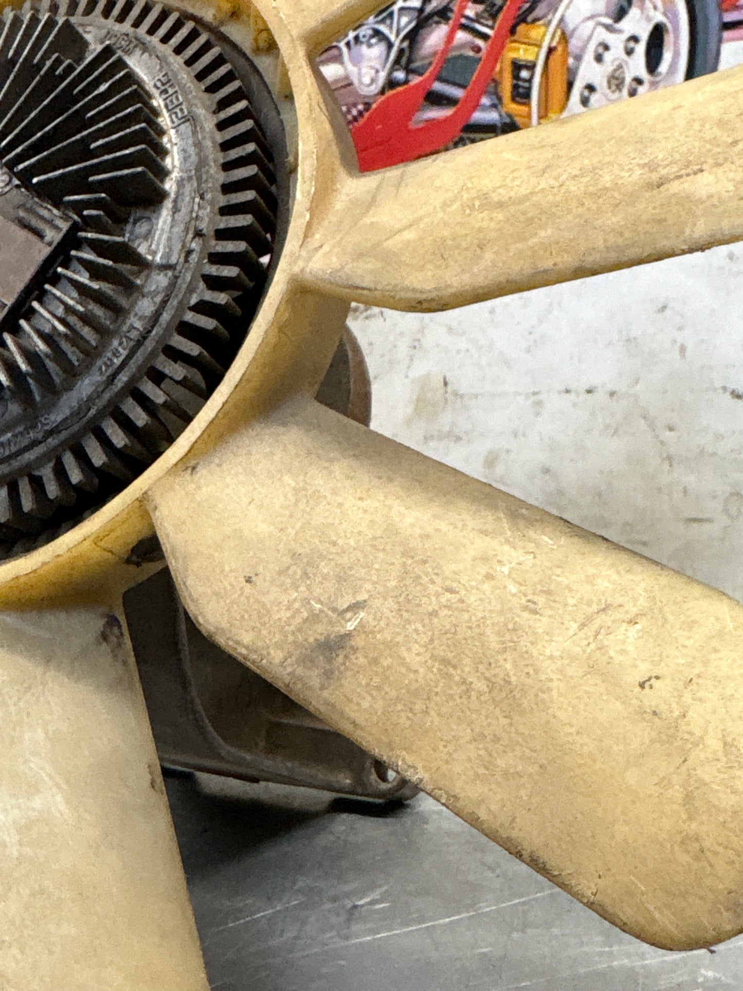 Porsche 928 late engine cooling fan clutch with bracket, used 92810611205 / 92810613701 / 9281061104R