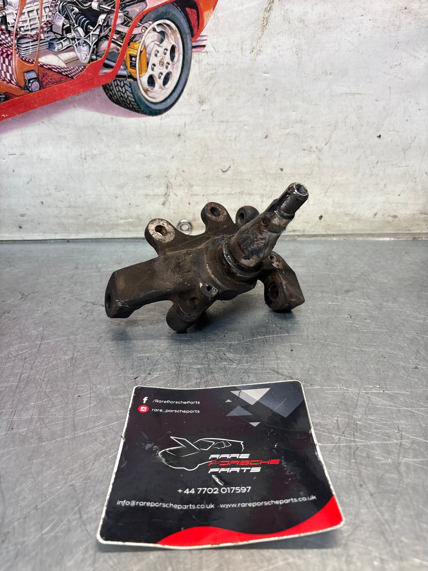 Porsche 928 left steering spindle knuckle, used 92834105703