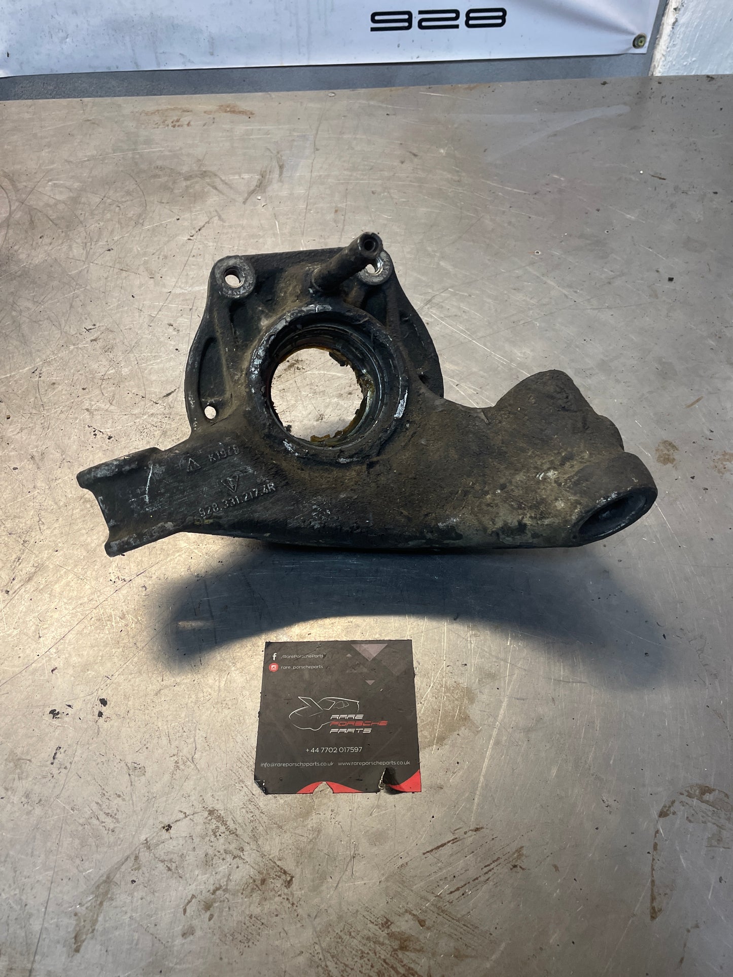 Porsche 928 rear left wheel hub carrier, used 9283312174R