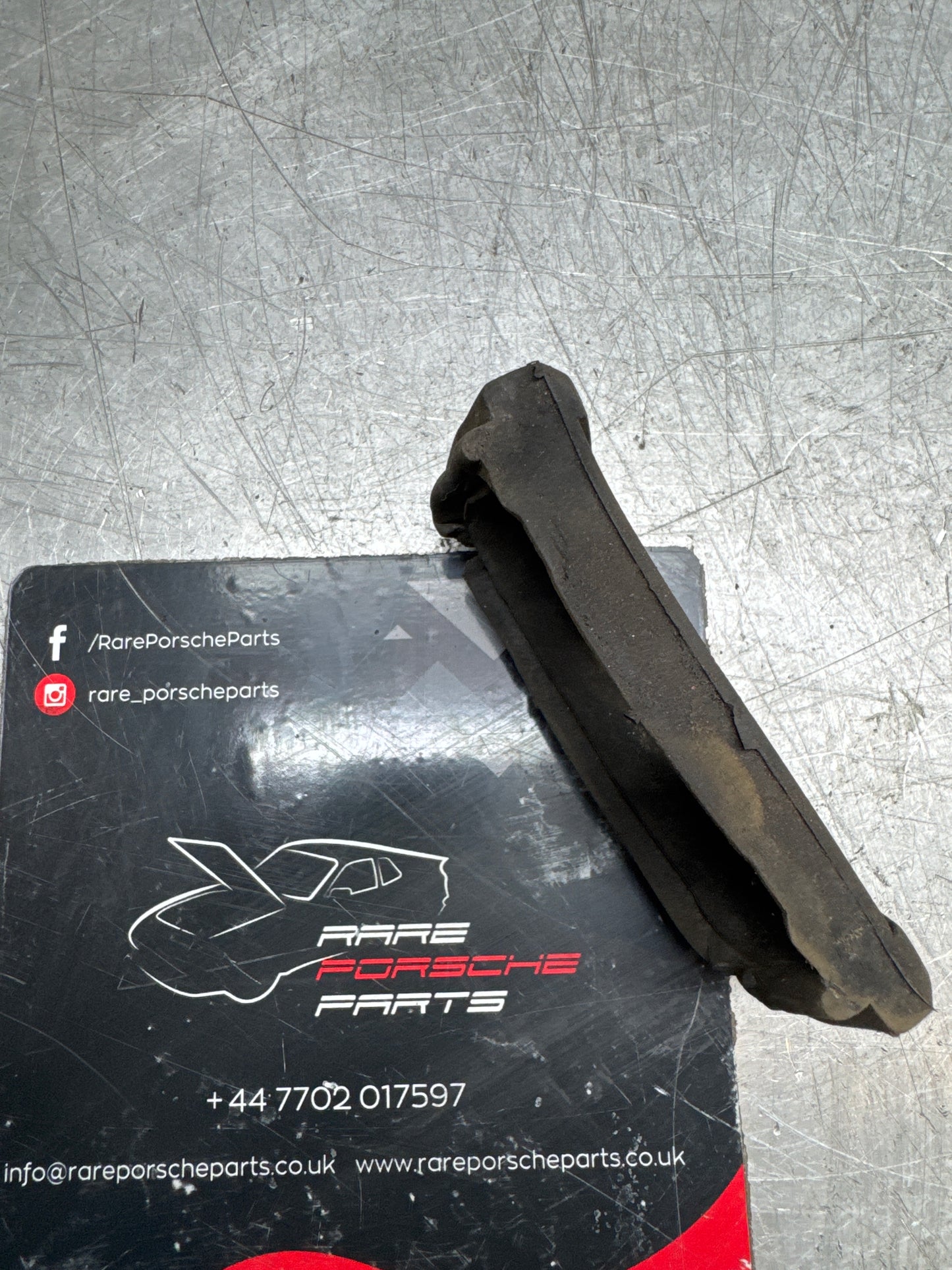Porsche 924 rear hatch pin seal gasket rubber 477827365D left, used