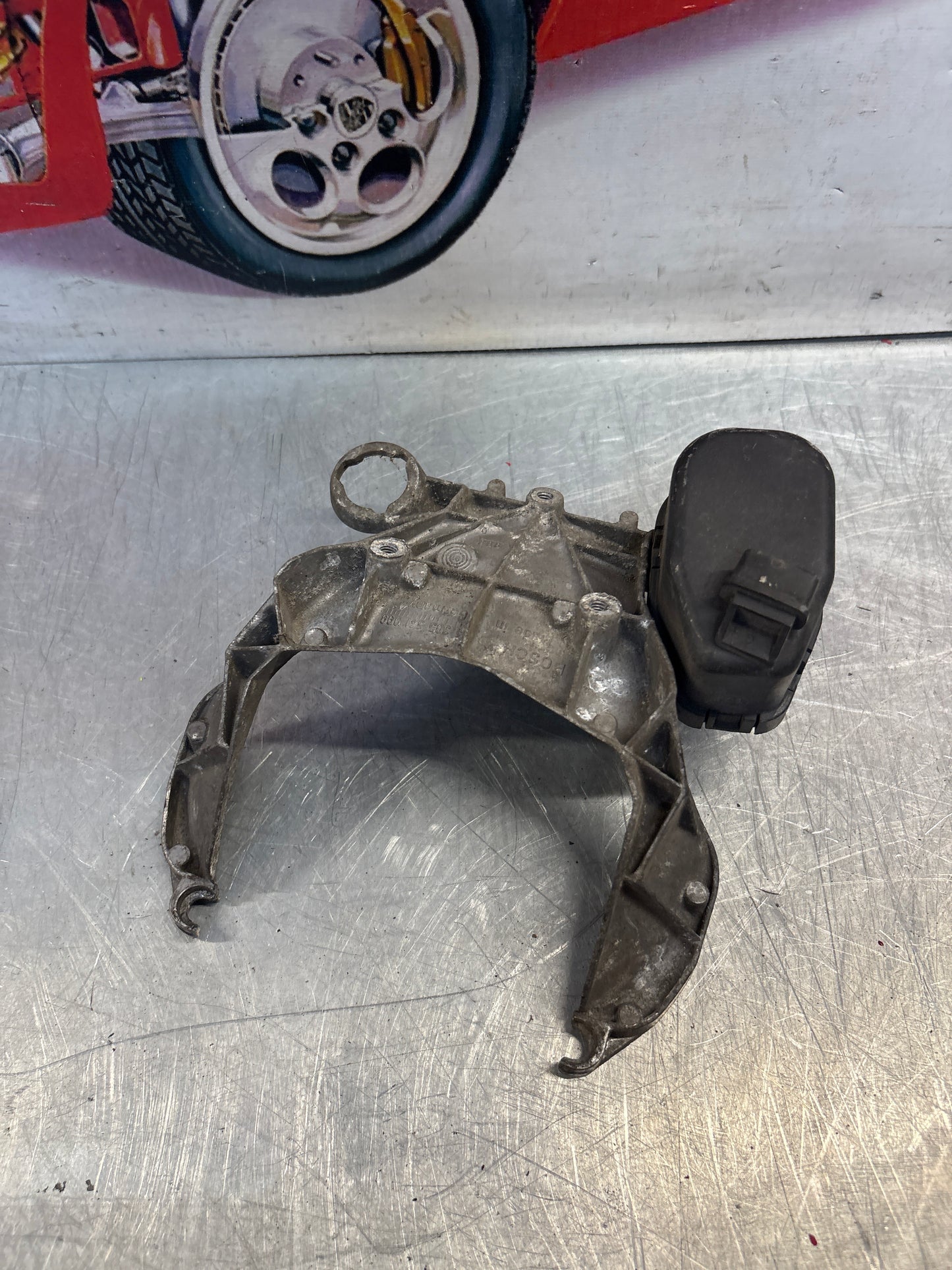 Porsche 968 headlight bracket housing,used  1305541099