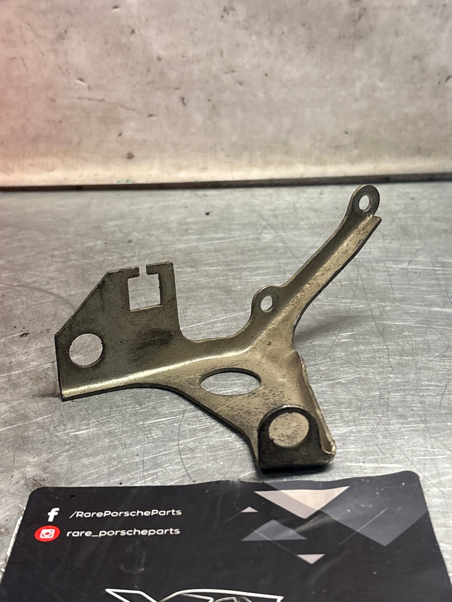 Porsche 928 intake flow meter cable guide bracket, used 92811021703