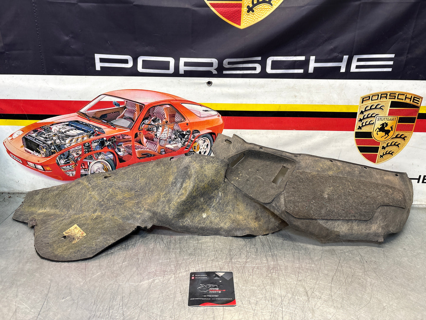 Porsche 924/944 85.5- rear left side trim carpet, black, 94455508301, used