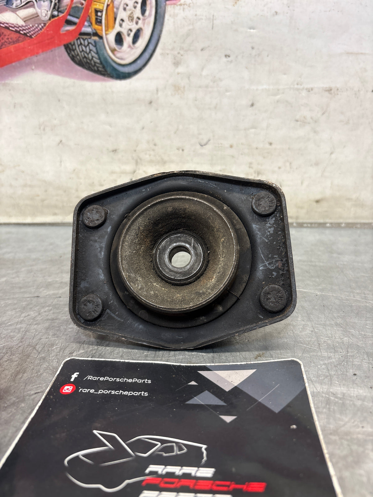 Porsche 924 / 944 front suspension bearing flange, 477412345, used