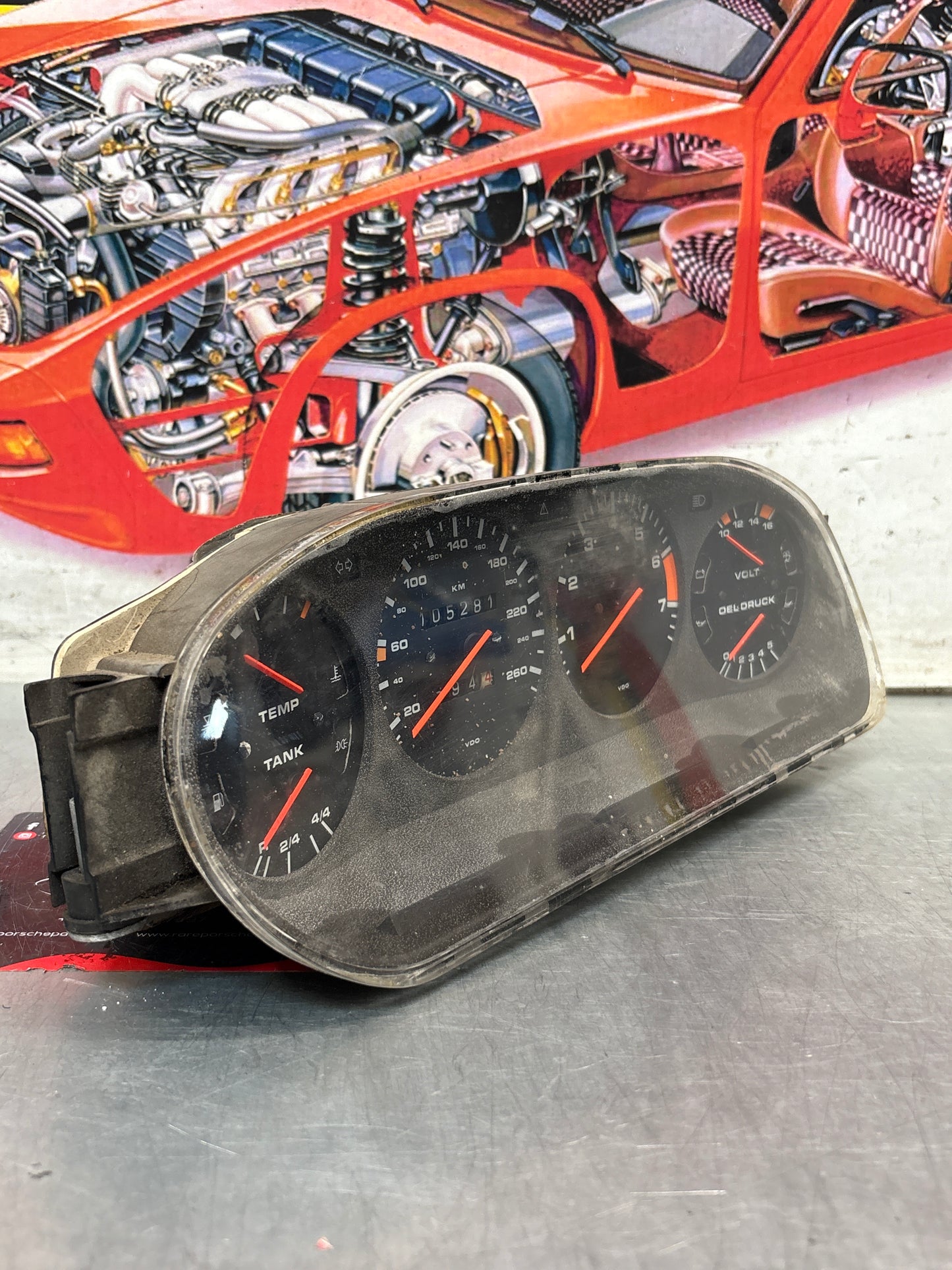 Porsche 928 dash clock binnacle pod speedometer, 92864110130 used  showing 105281 Km, plastic screen has some scratches