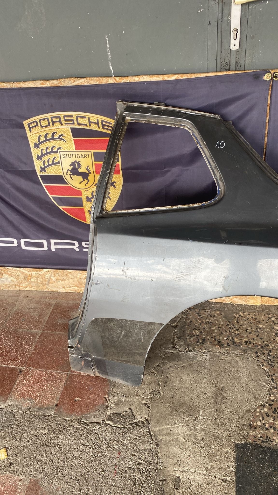 Porsche 944 left side cut, rear fender, 94450390303 with some rust