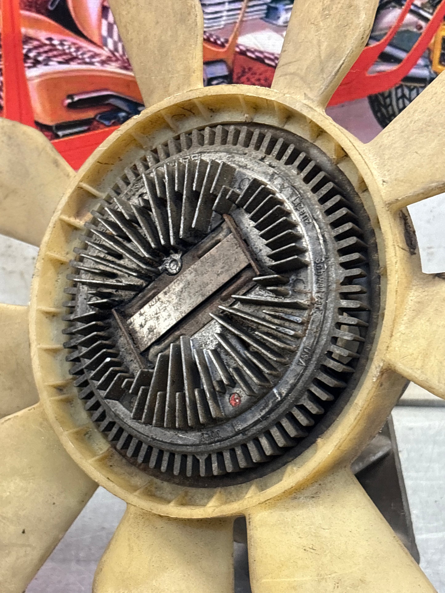 Porsche 928 late engine cooling fan clutch with bracket, used 92810611205 / 92810613701 / 9281061104R