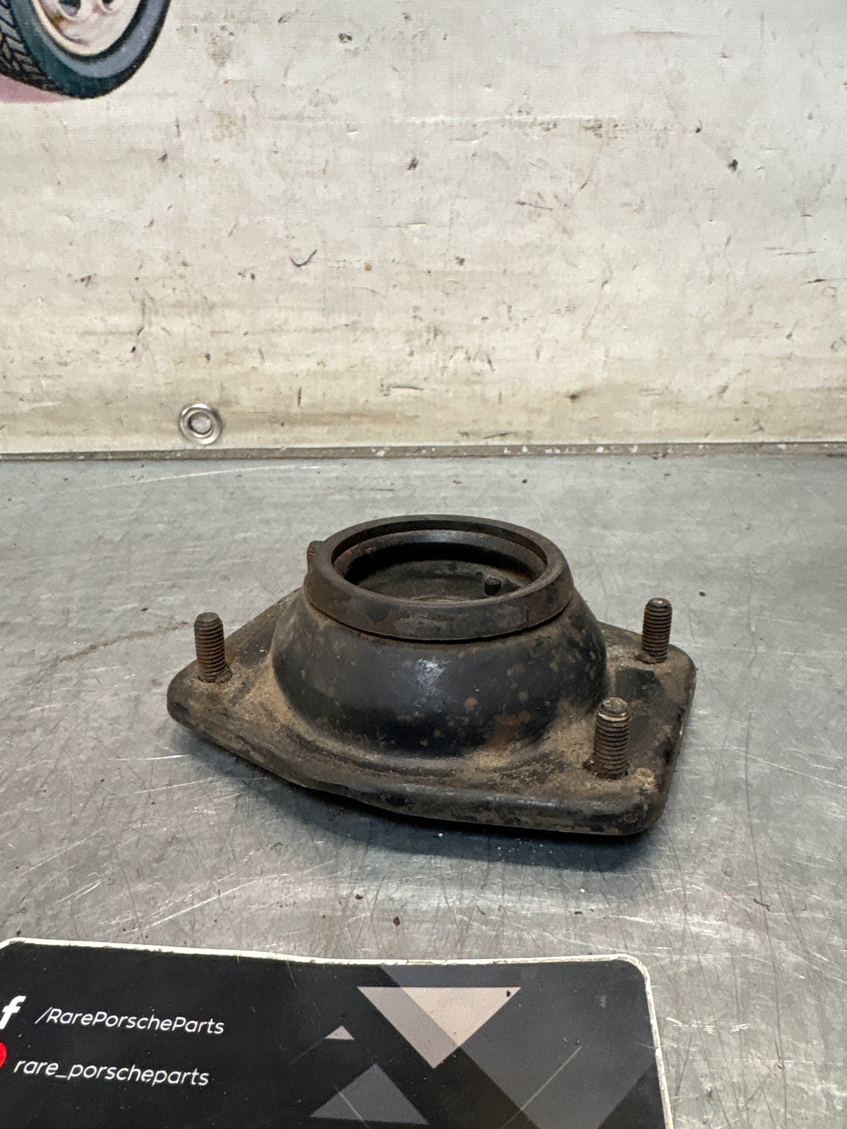 Porsche 924 / 944 front suspension bearing flange, 477412345, used