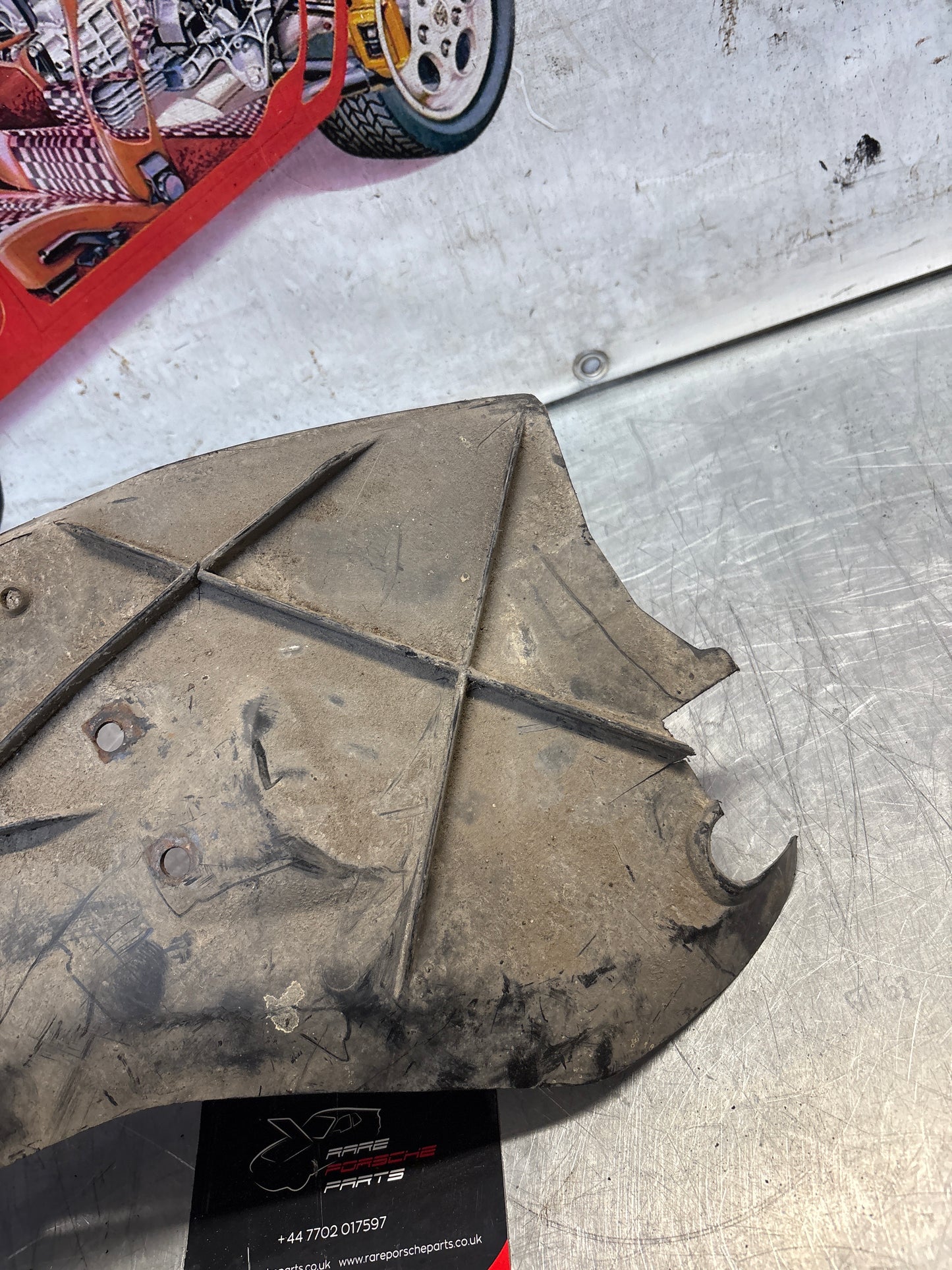 Porsche 928 rear right fender wheel cover, used 92850430402