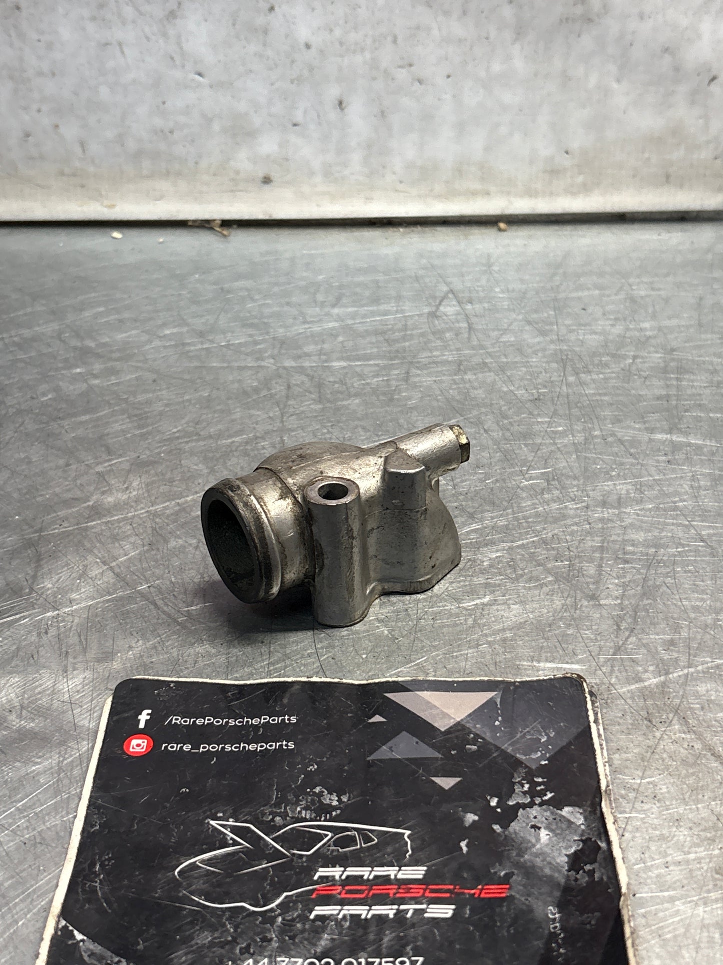 Porsche 944S water cooling neck, used 94410430801 / 94410430801R