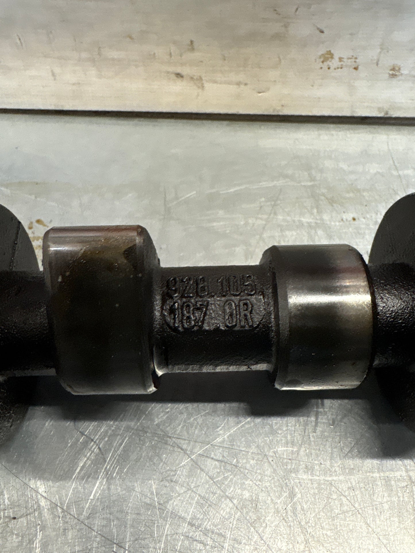 Porsche 928 cam shaft, used 9281051870R