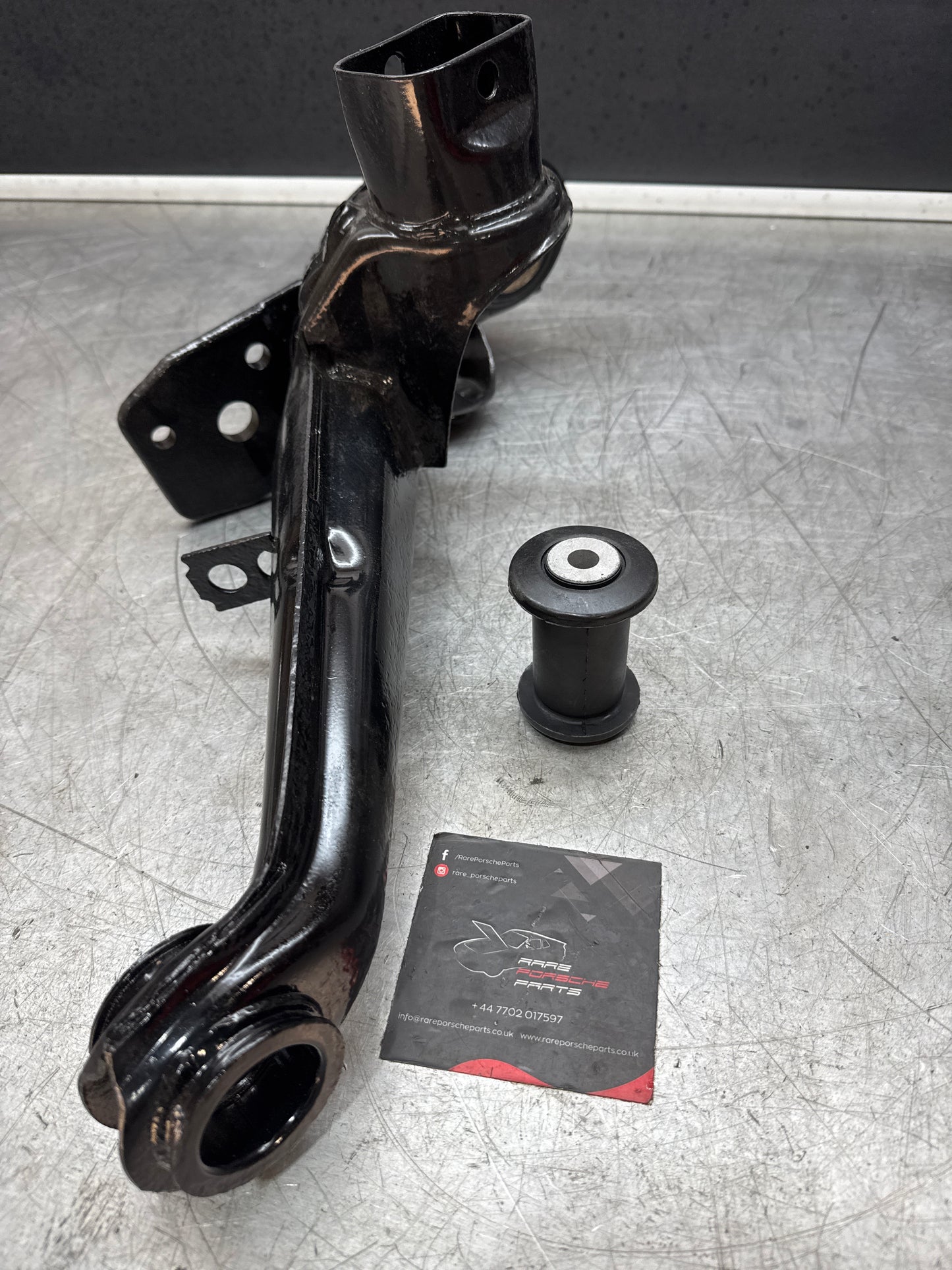 Porsche 924 944  -85.5 Rear left trailing arm, refurbished 94433102100